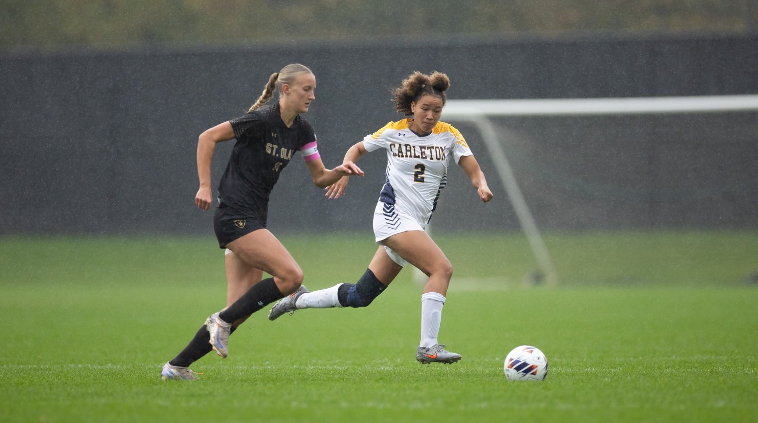 Zaraya Jordan defending St. Olaf forward