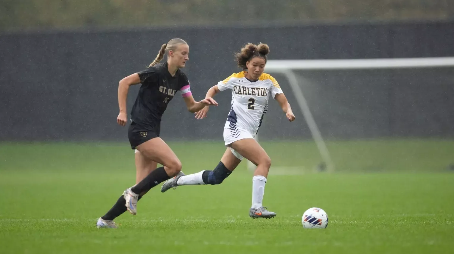 Zaraya Jordan defending St. Olaf forward