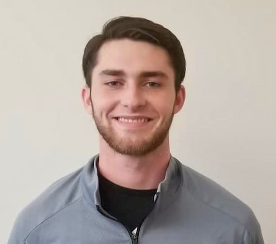 David Eggert smiling for his headshot