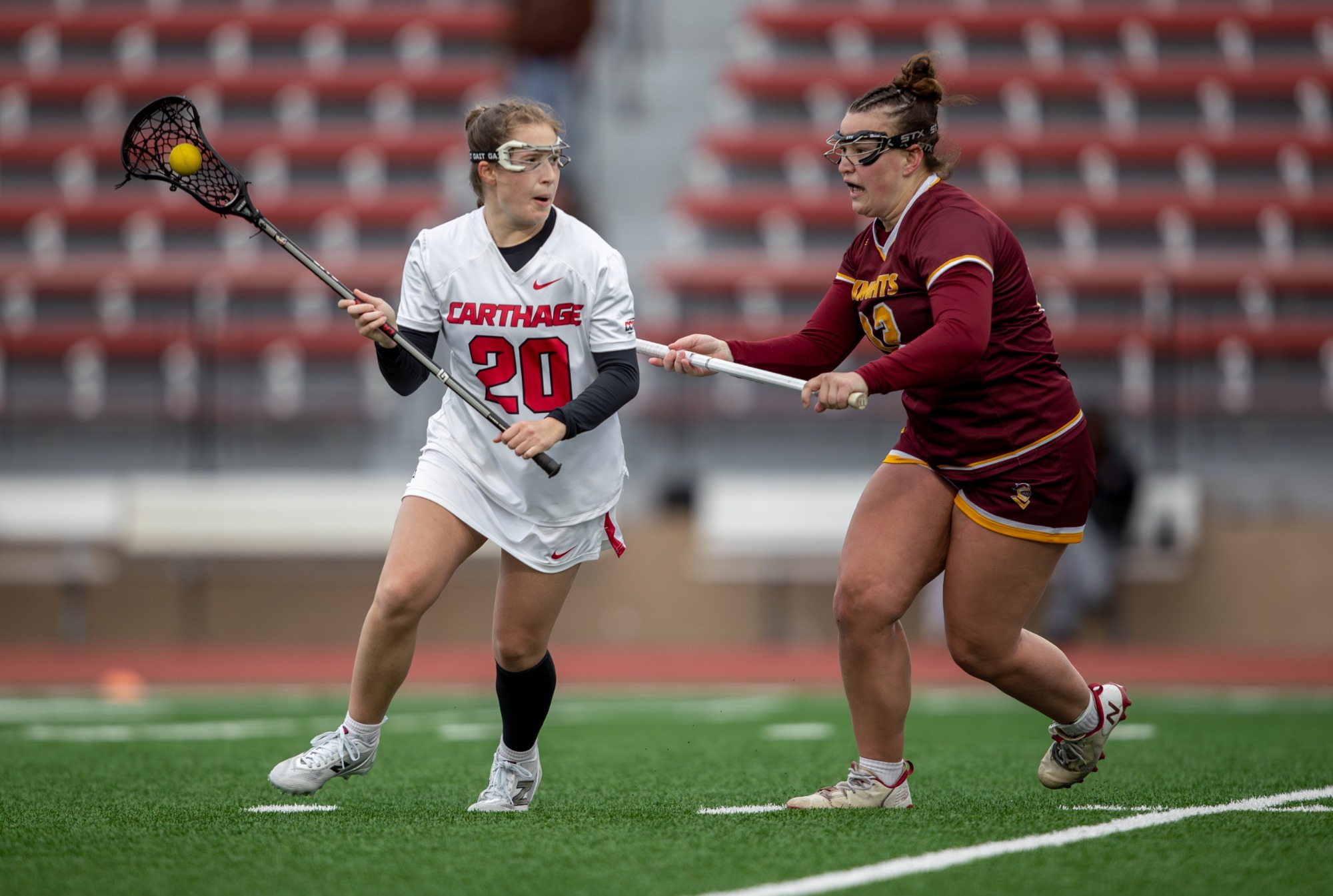 Bailey Koestel battles for position with defender