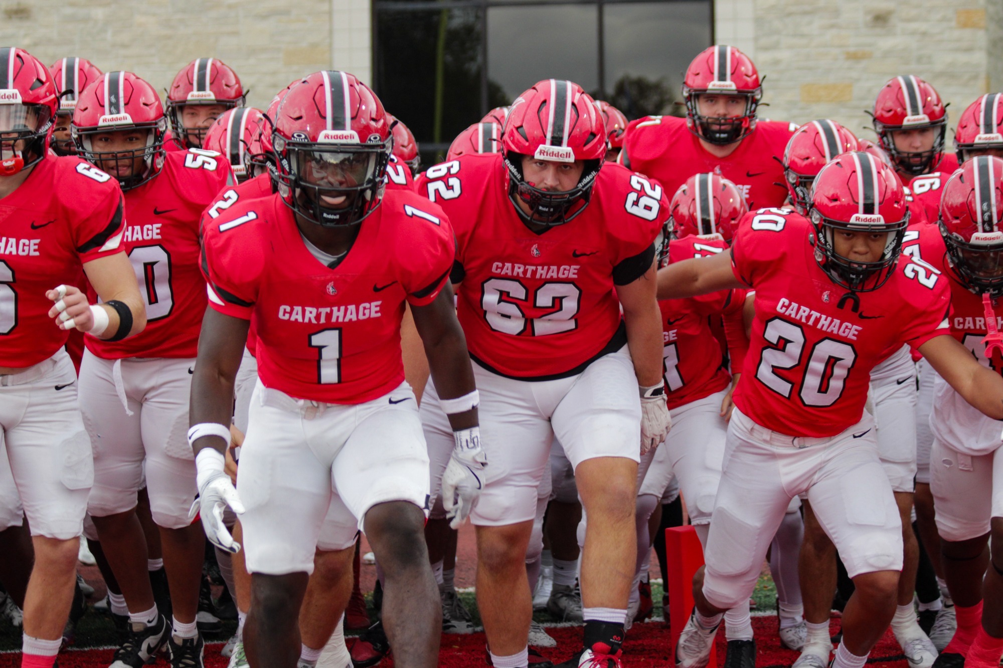 Football team running out of the tunnel 