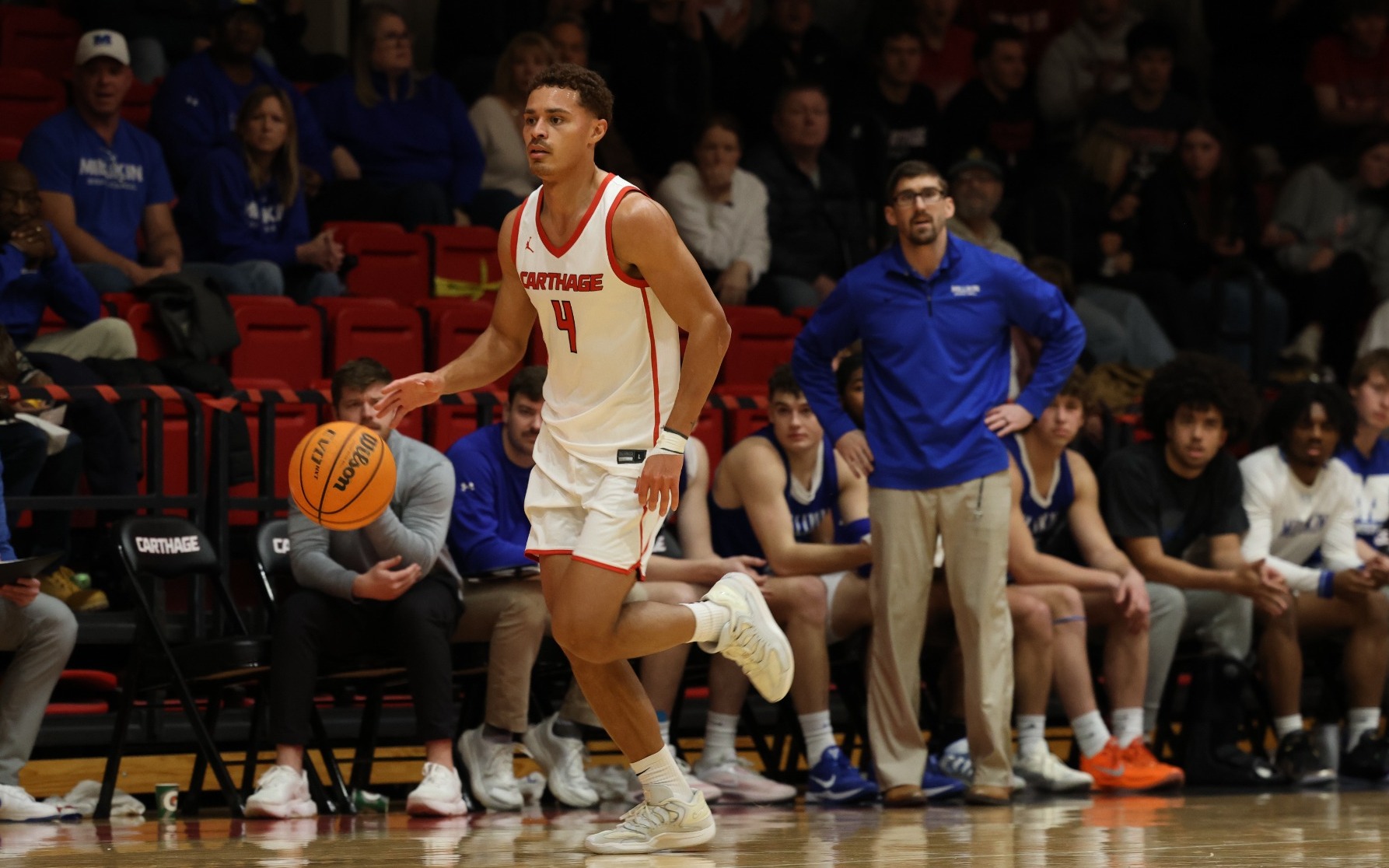AJ Williams dribbles up court