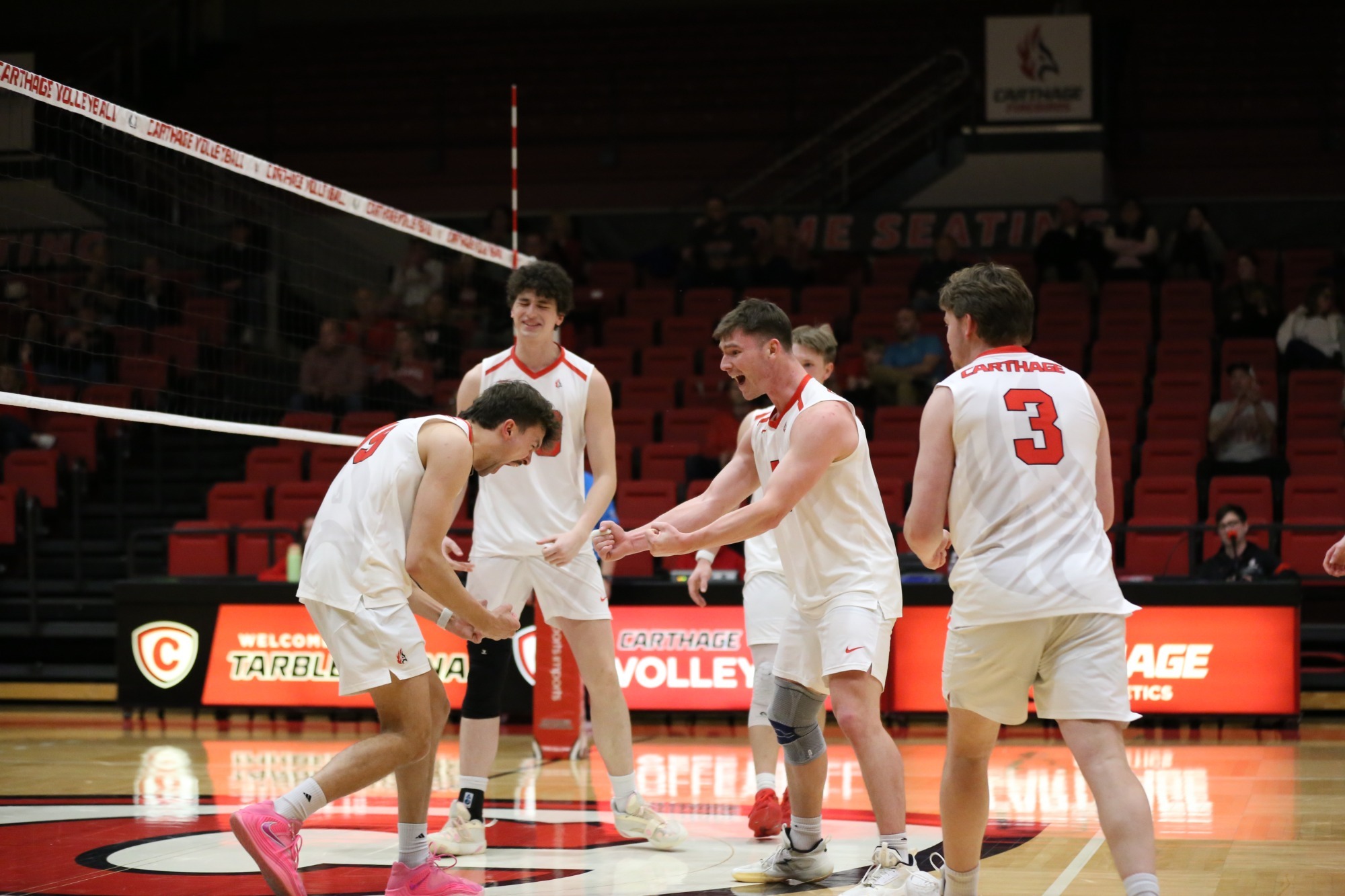 men's volleyball celebrates a point 