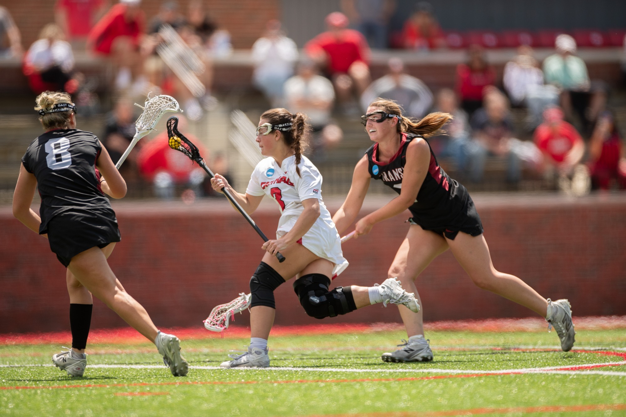 Auggie Claridge weaves through traffic