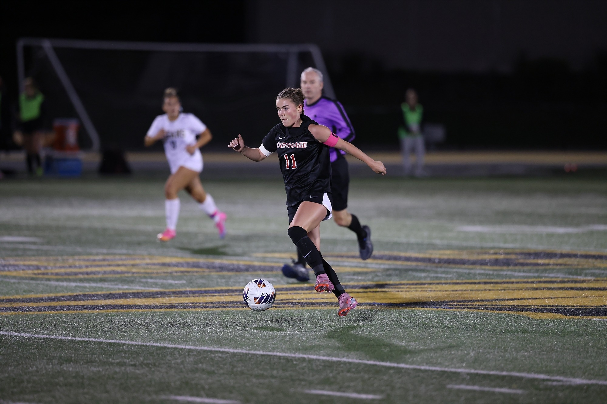Lydia Sachs dribbles the ball against Wisconsin-Oshkosh