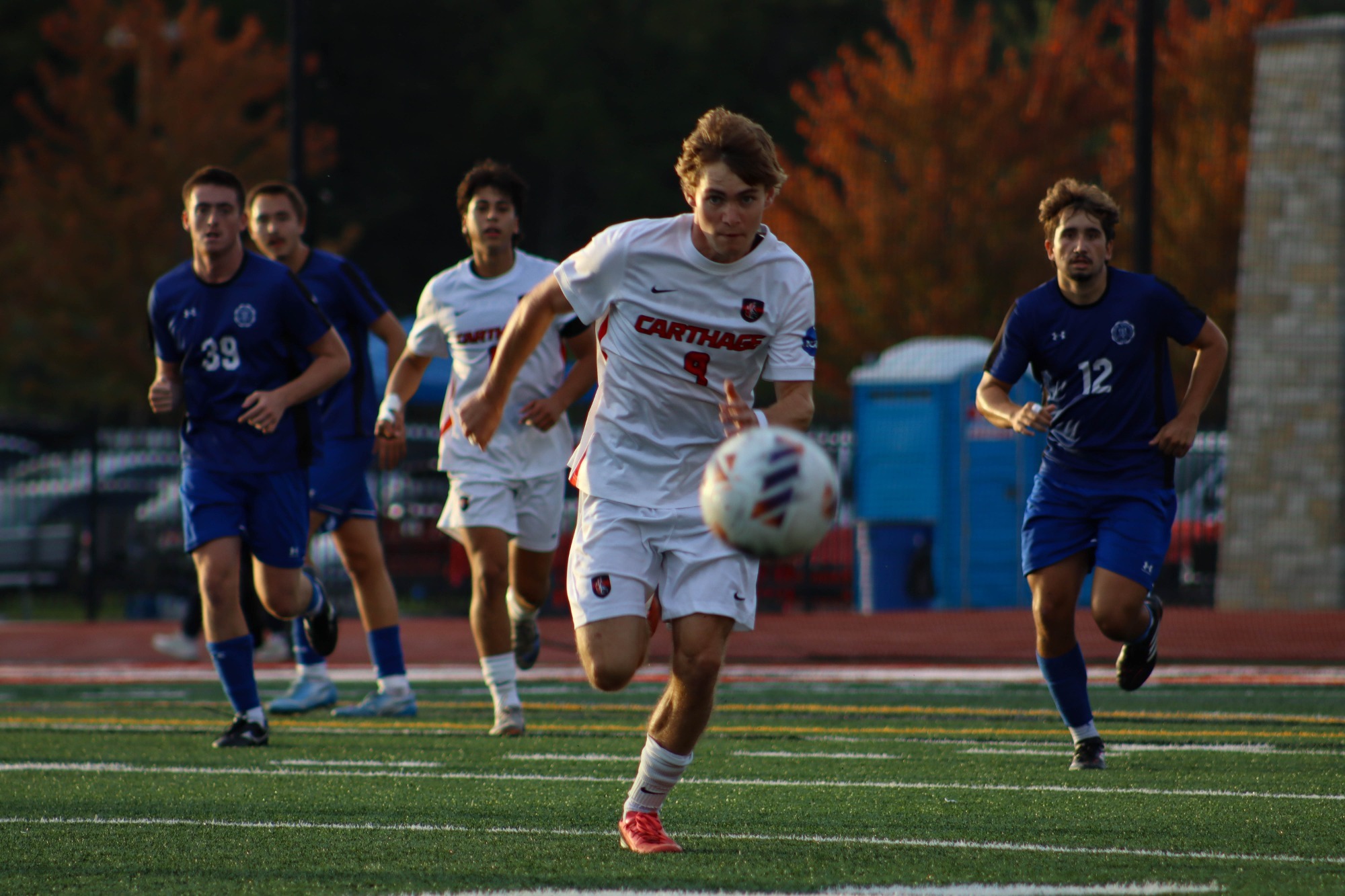 Emmitt Hansen chases down the ball against Millikin