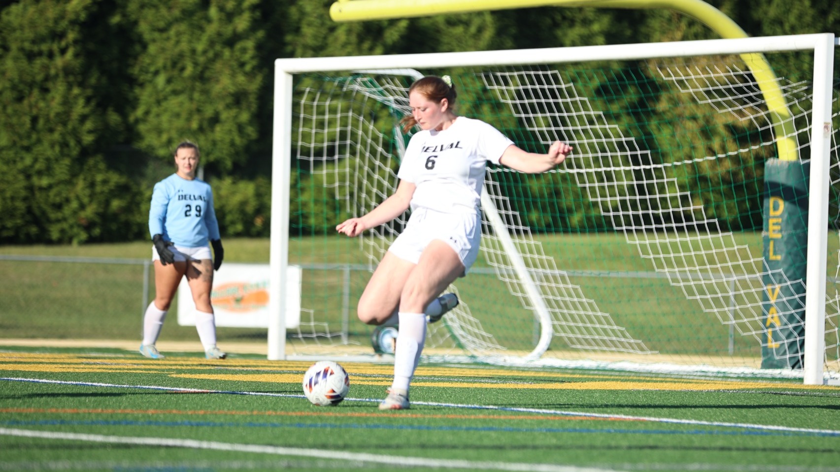 Hannah Dahl playing soccer for the Aggies