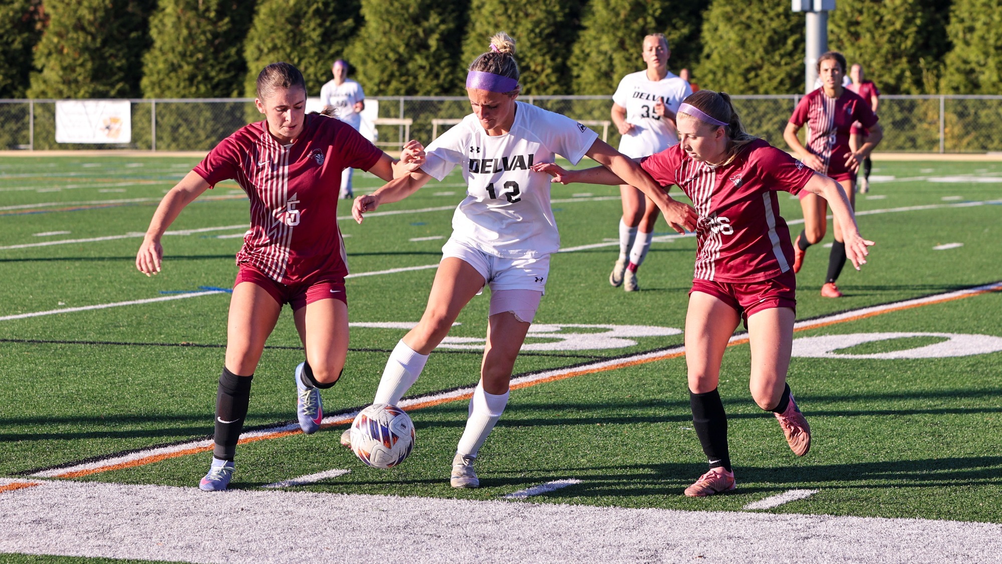 Marisa Rogers playing soccer against Arcadia