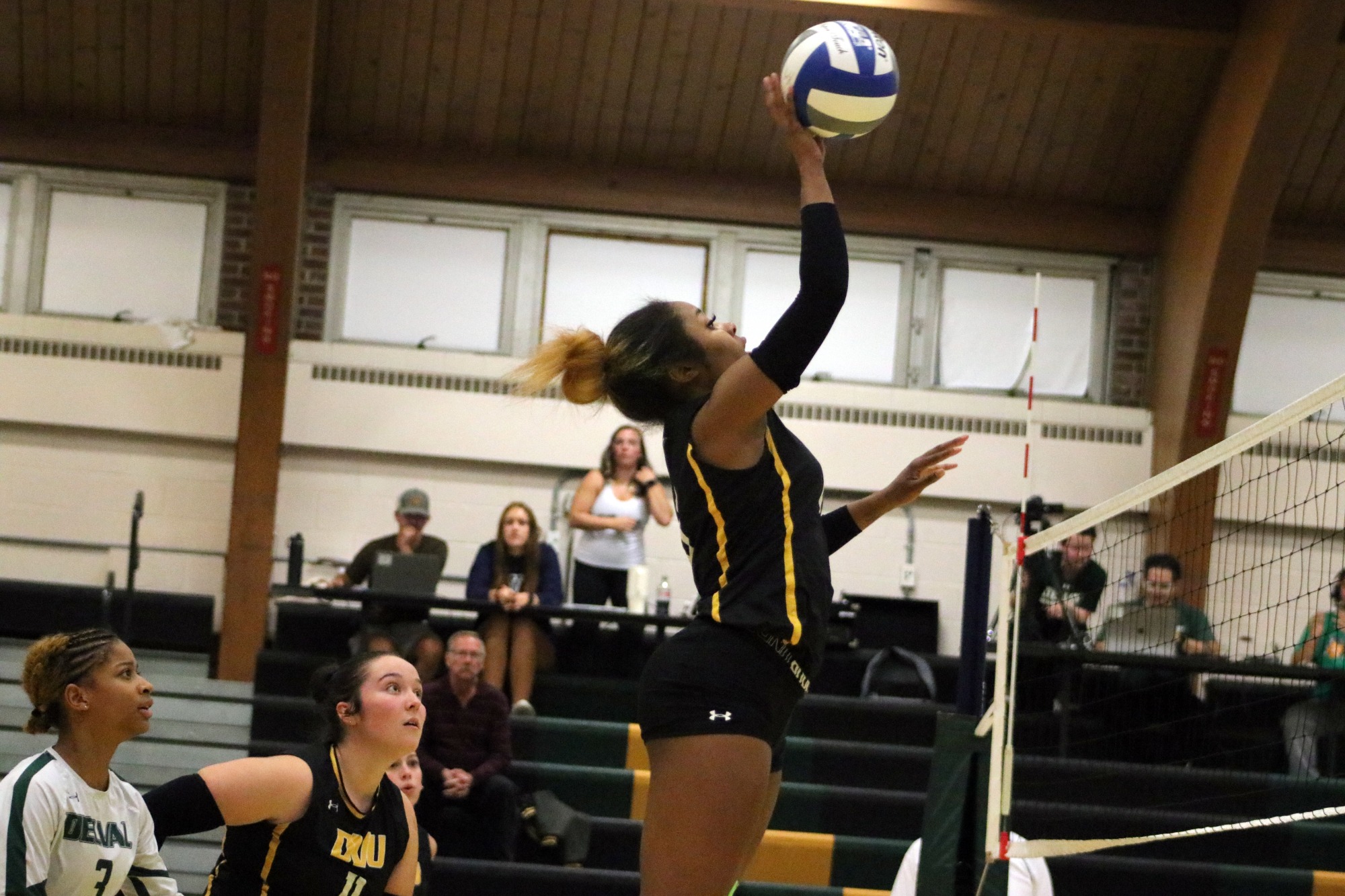Kai Logan playing women's volleyball vs. DeSales