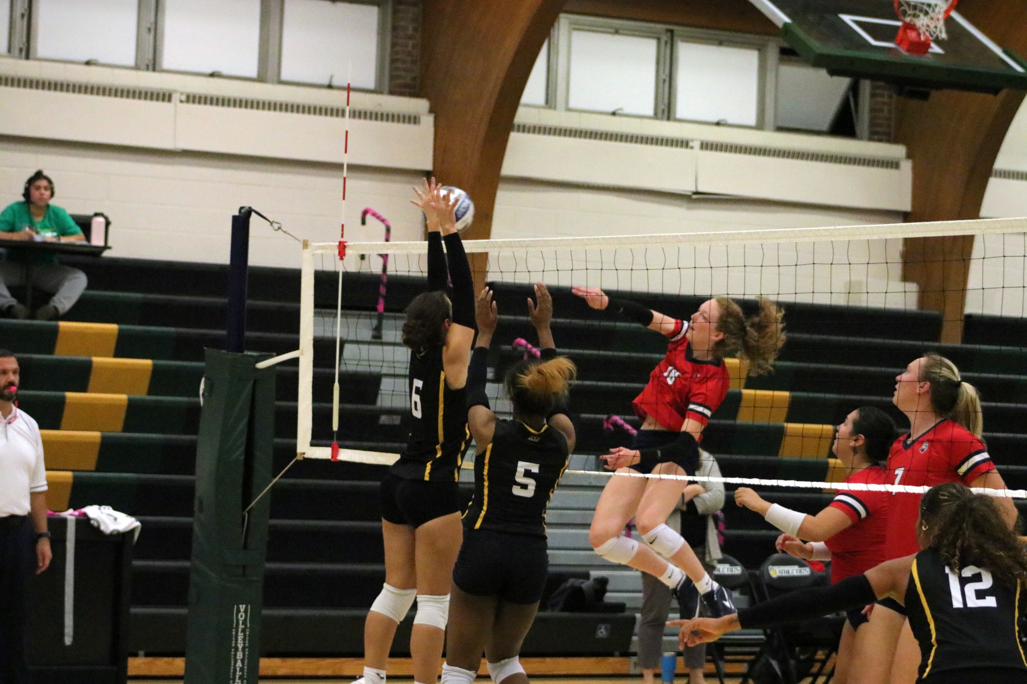 Cassandra Gloster playing women's volleyball vs. DeSales