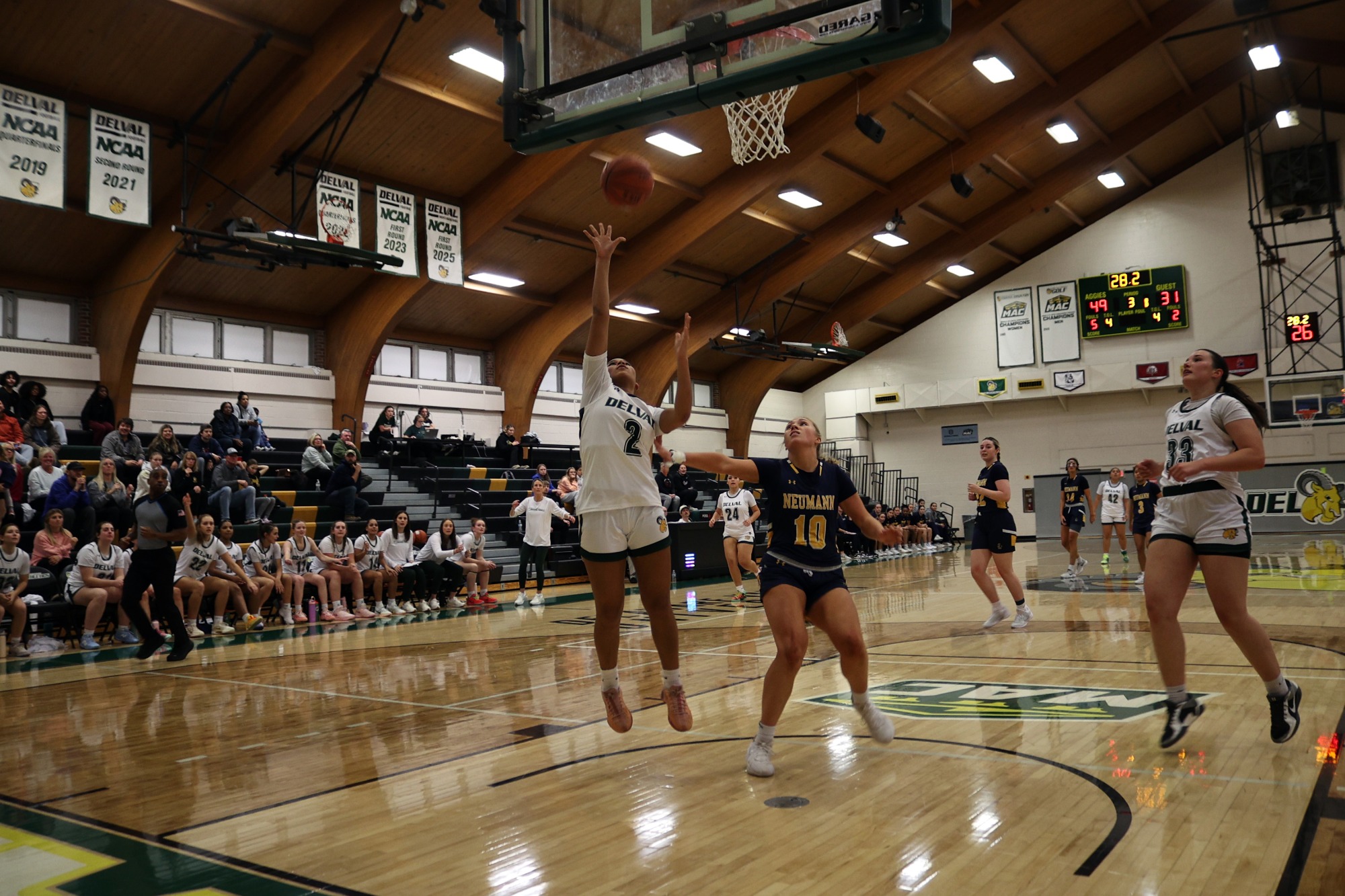 Anijah Davis playing women's basketball vs. Neumann