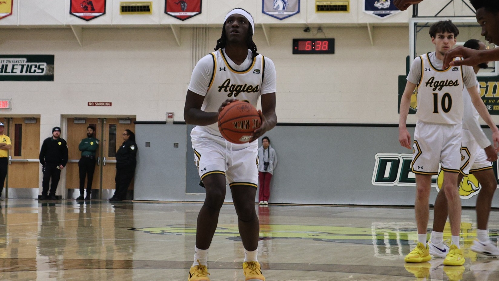 JT Wright playing basketball against Rowan