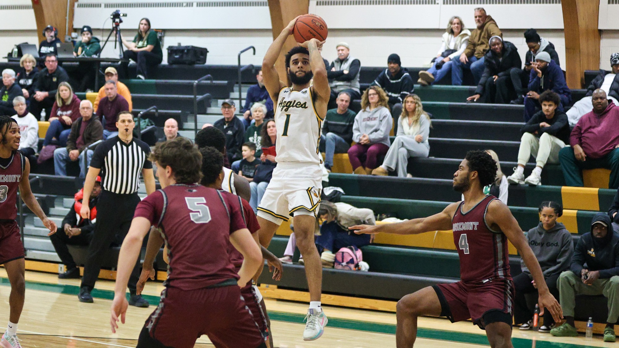 Mike Herrin playing basketball against Rosemont