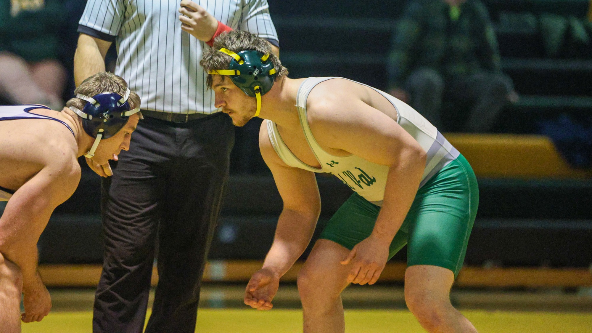 Neil Miller wrestling against Messiah