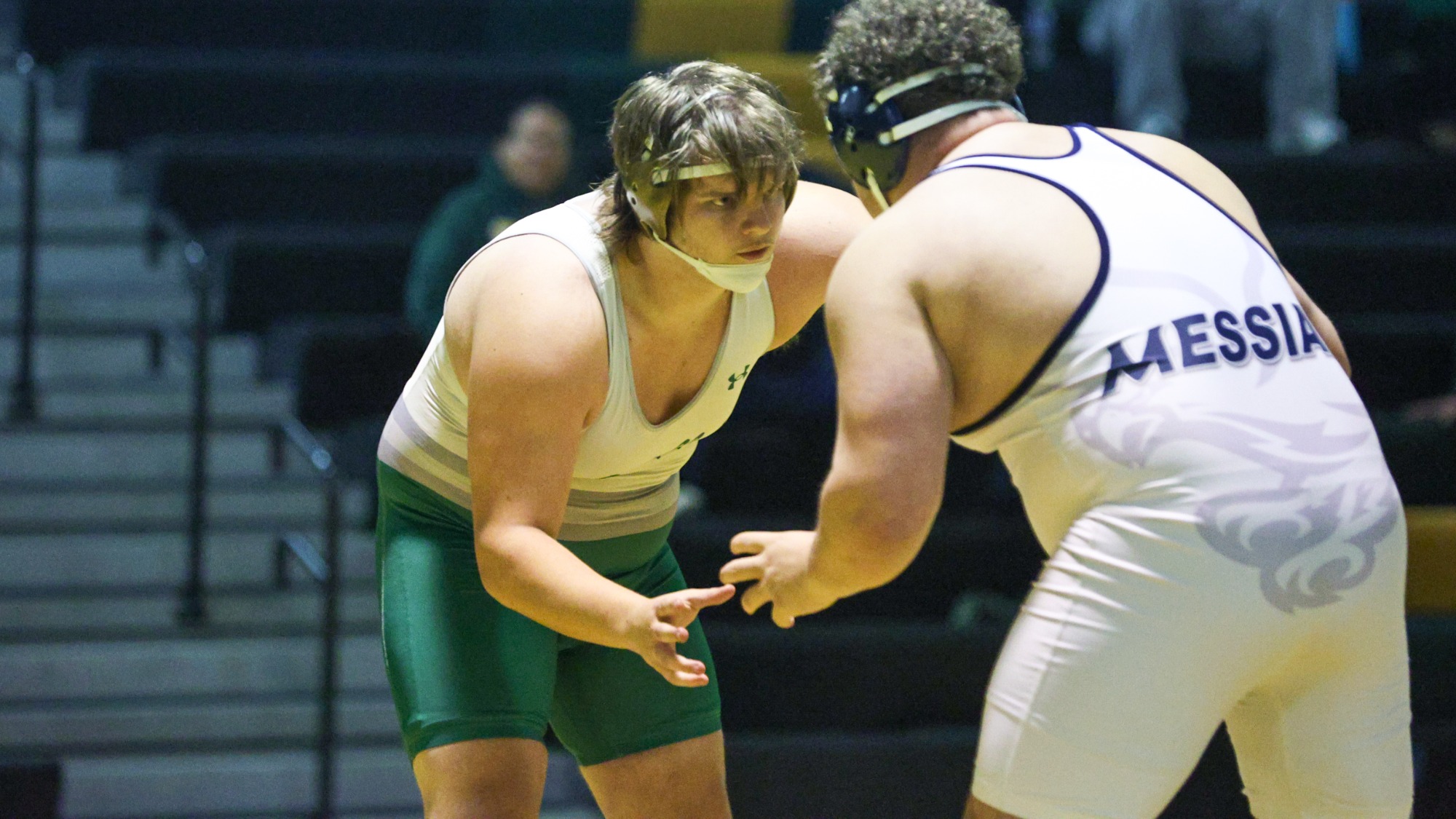 Nate Obrzut wrestling against Messiah