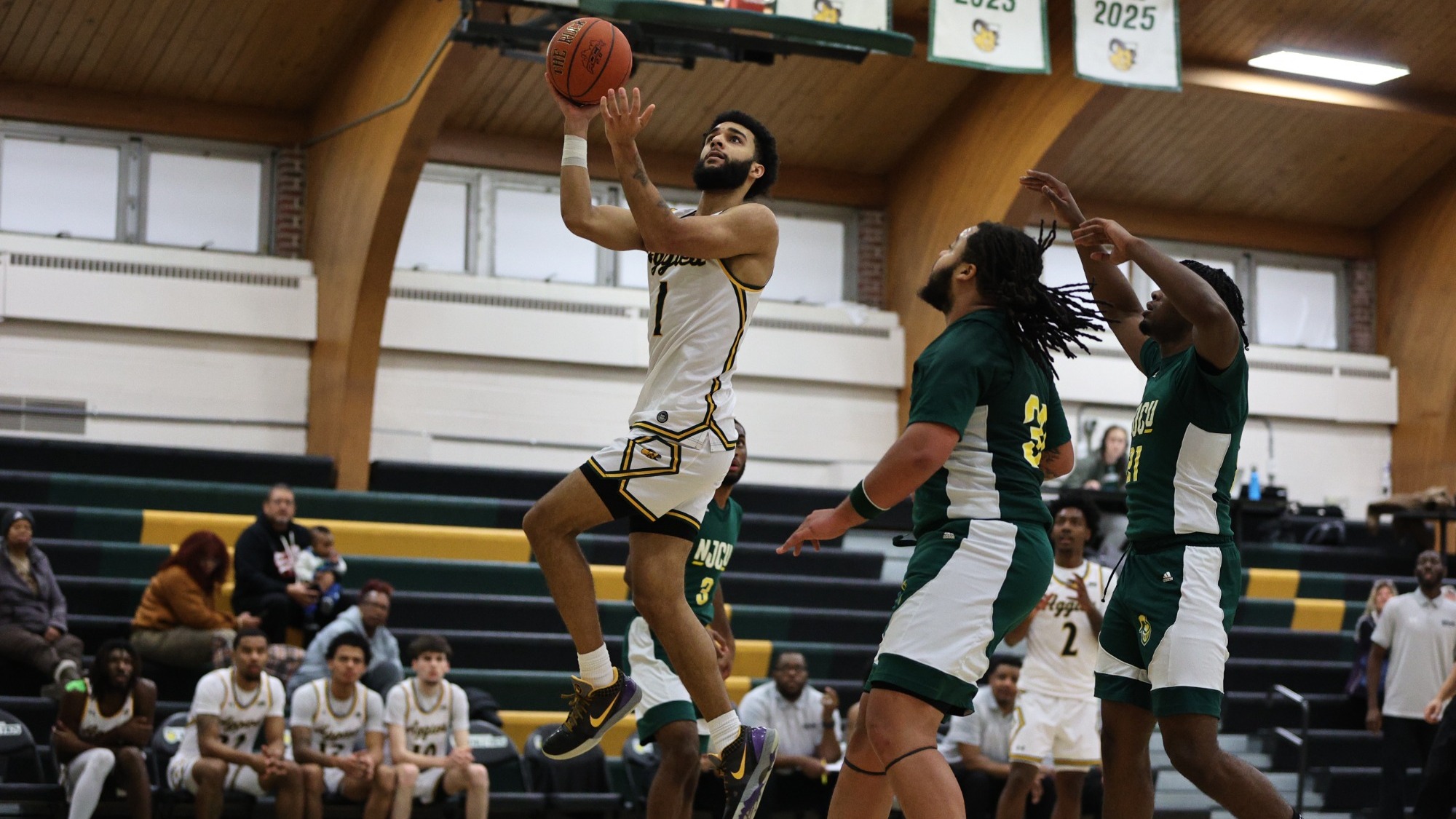 Mike Herrin playing basketball against New Jersey City