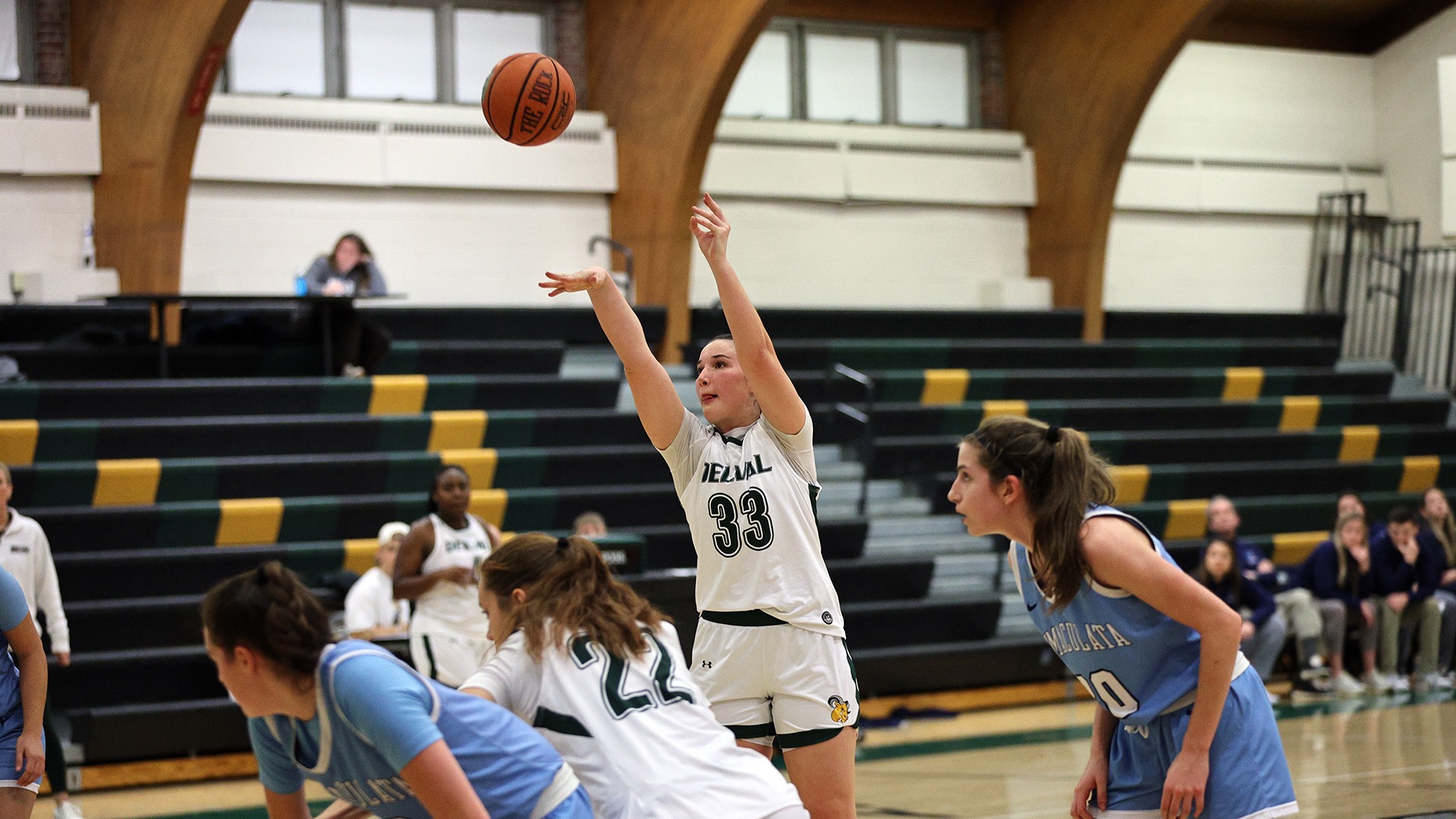 Alexis Wright playing women's basketball vs. Immaculata