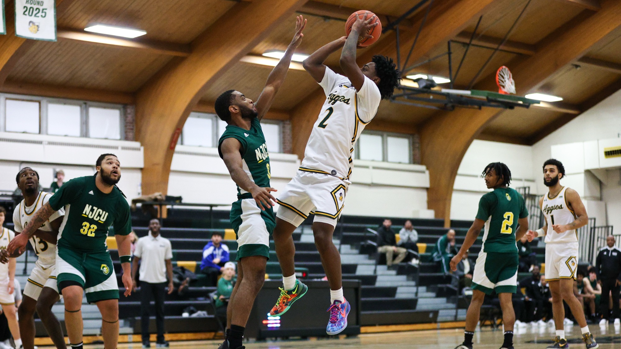 Antonio Redding playing basketball against New Jersey City