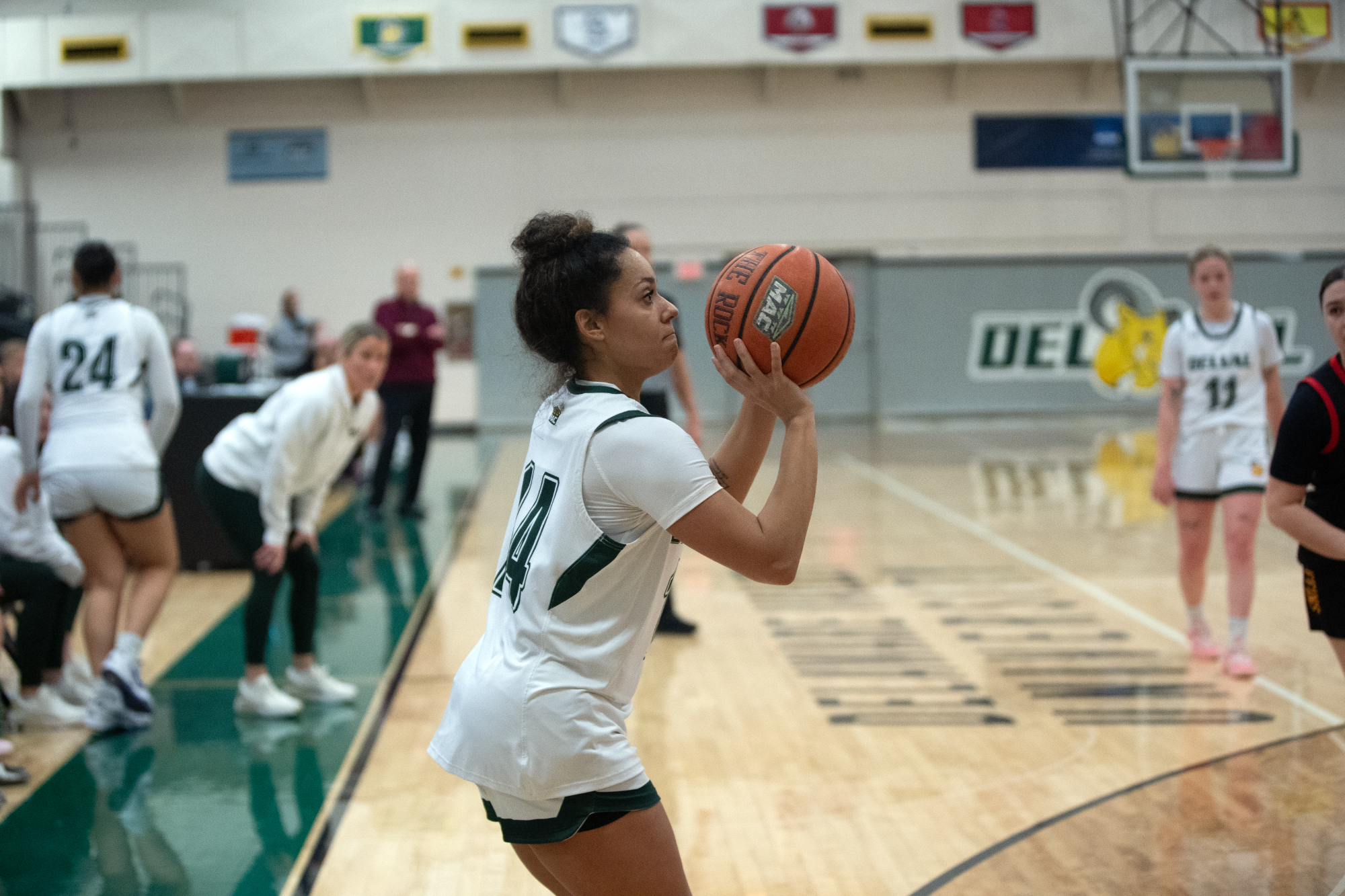 Ciana Feliciano playing women's basketball vs. Gwynedd Mercy