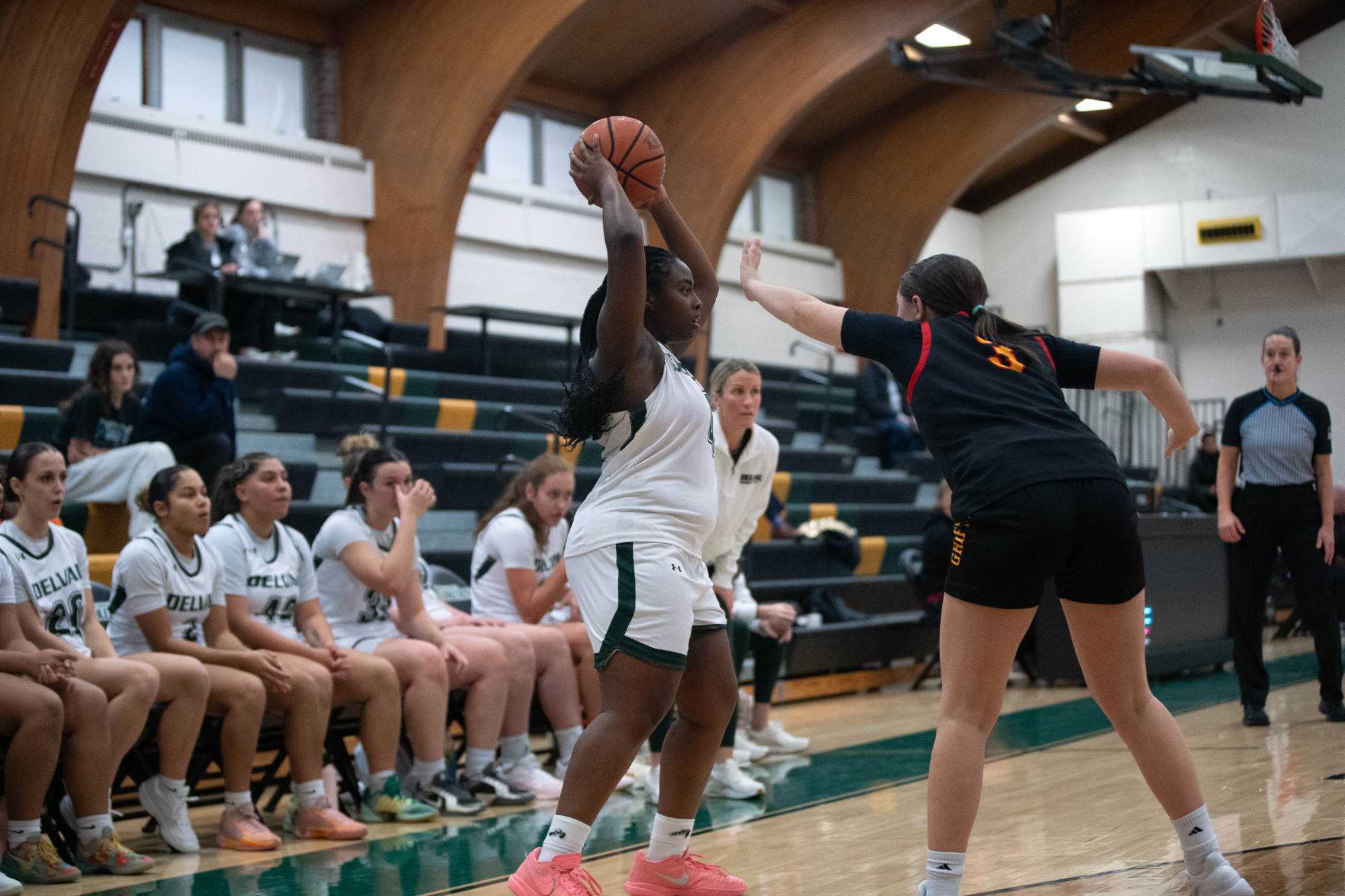 Whitney Evans playing women's basketball vs. Gwynedd Mercy