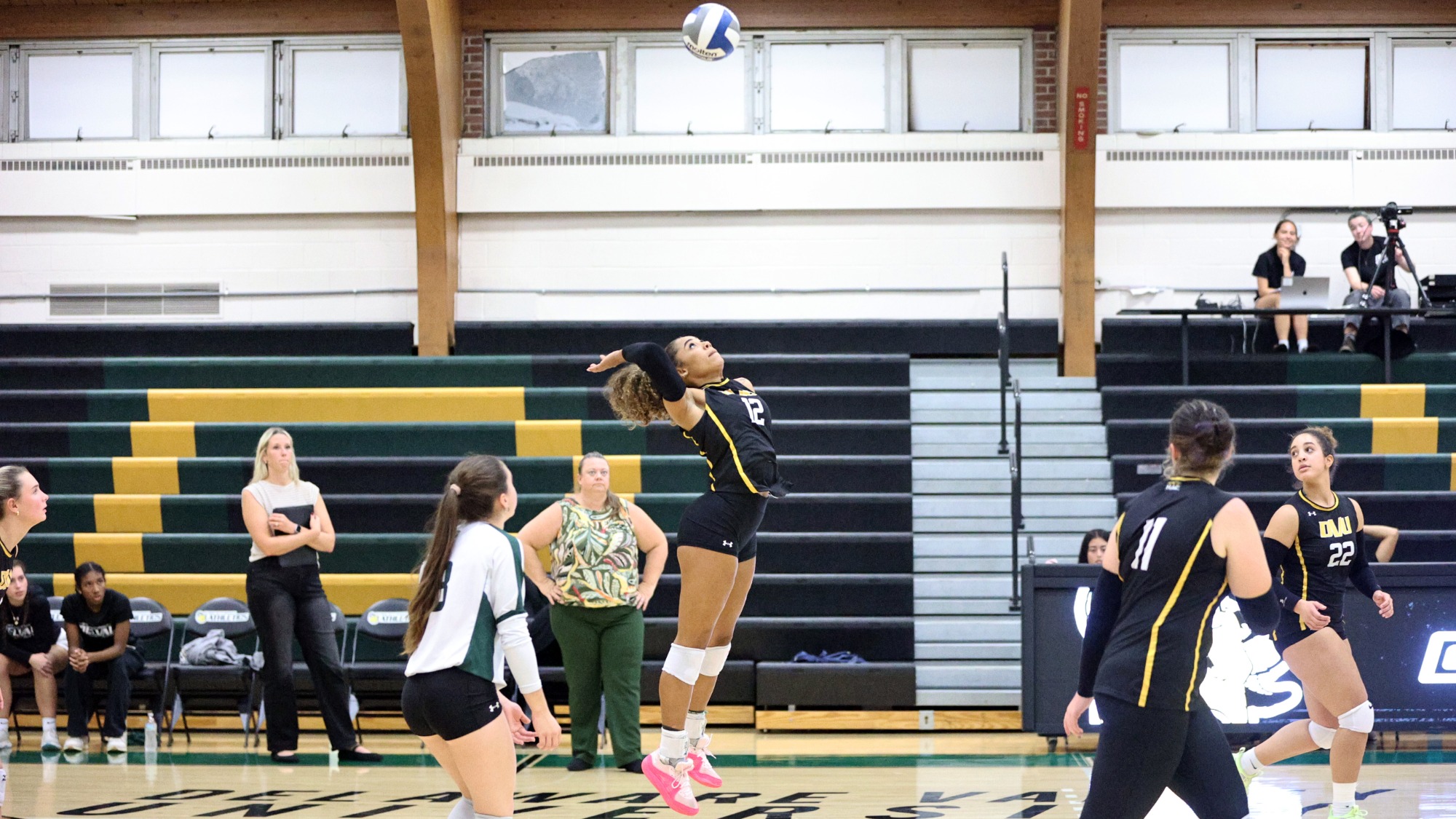 Monique Smith playing women's volleyball vs. Arcadia