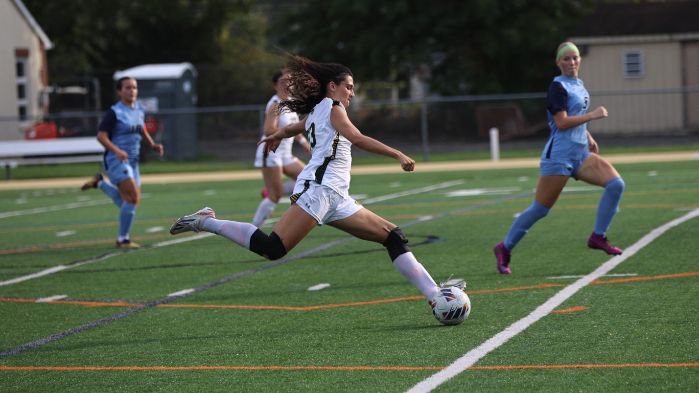 Gianna Grassifulli playing soccer against PSU-S