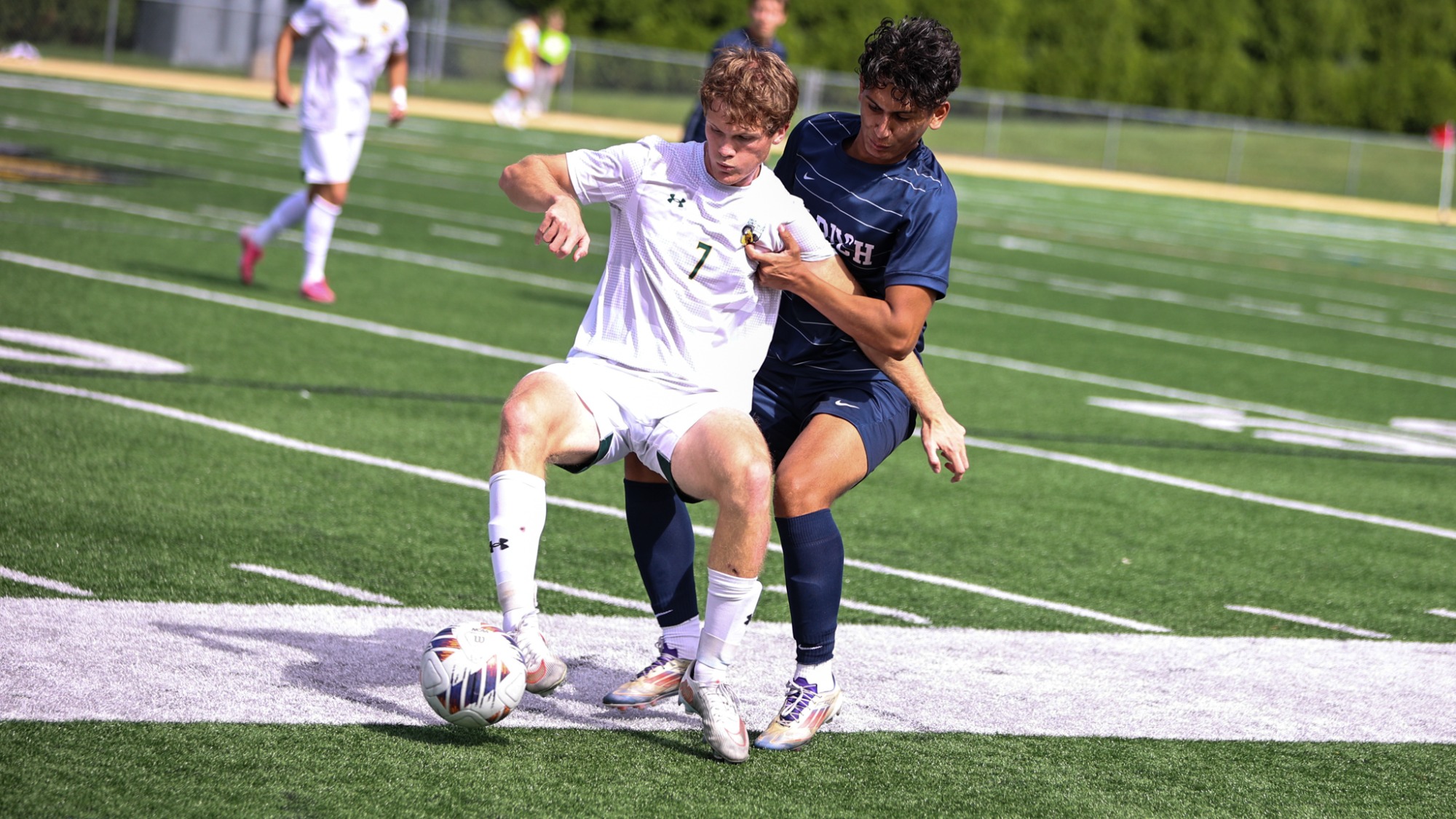 Elijah Purtle playing soccer against Baruch