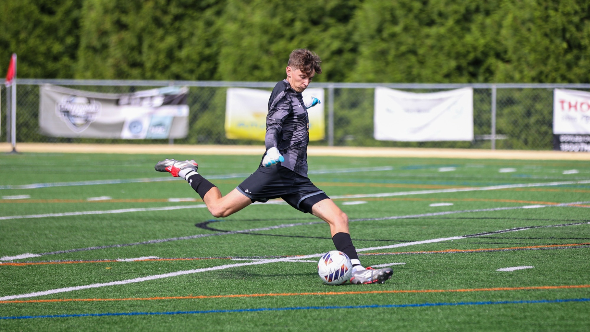 Nick Becker playing soccer against Baruch