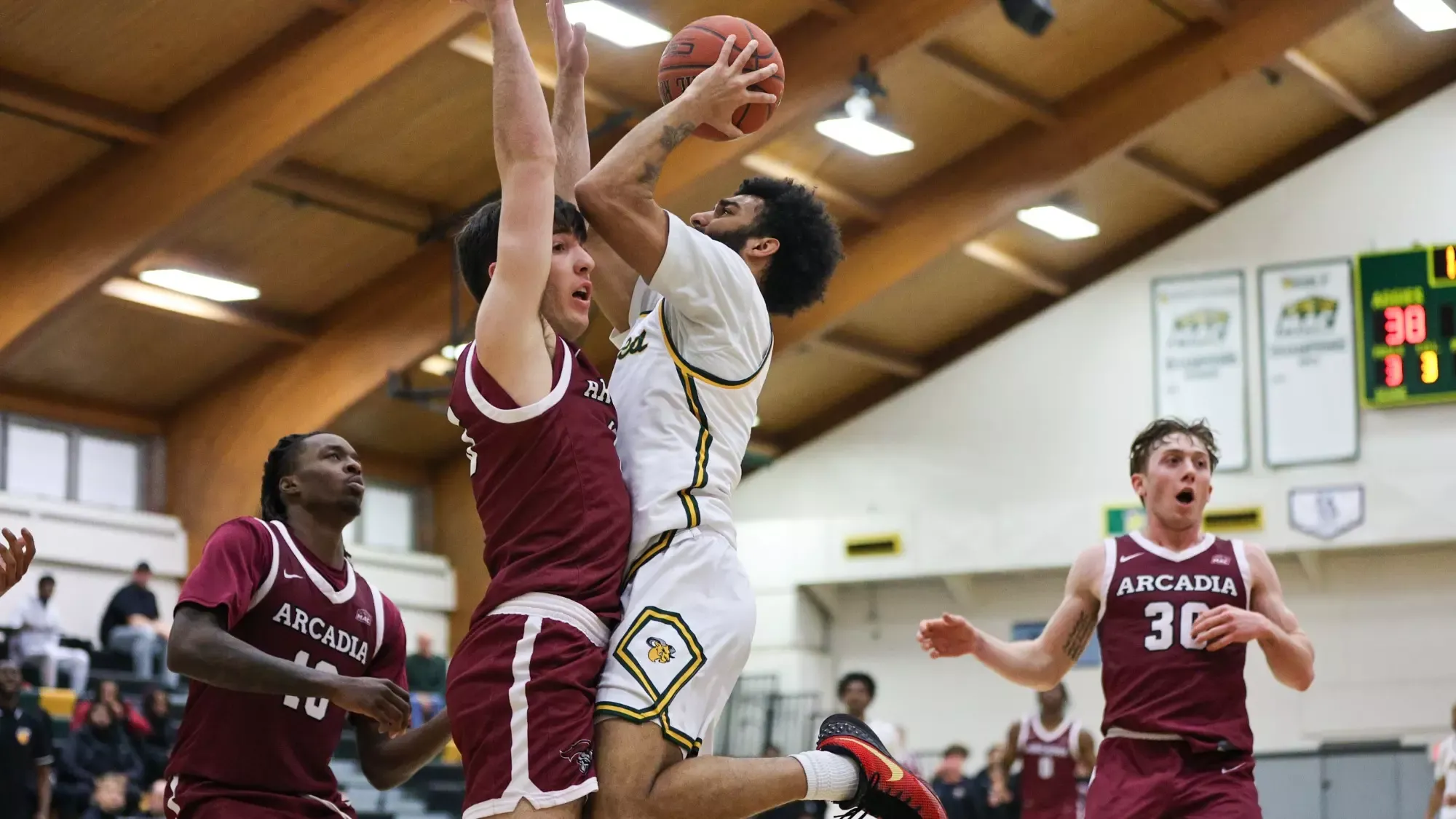 Mike Herrin playing basketball against Arcadia