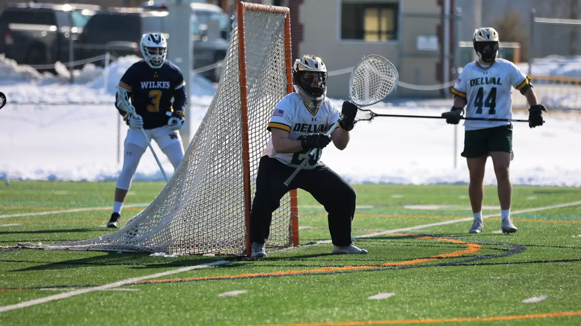 Daniel Hickling playing lacrosse against Wilkes