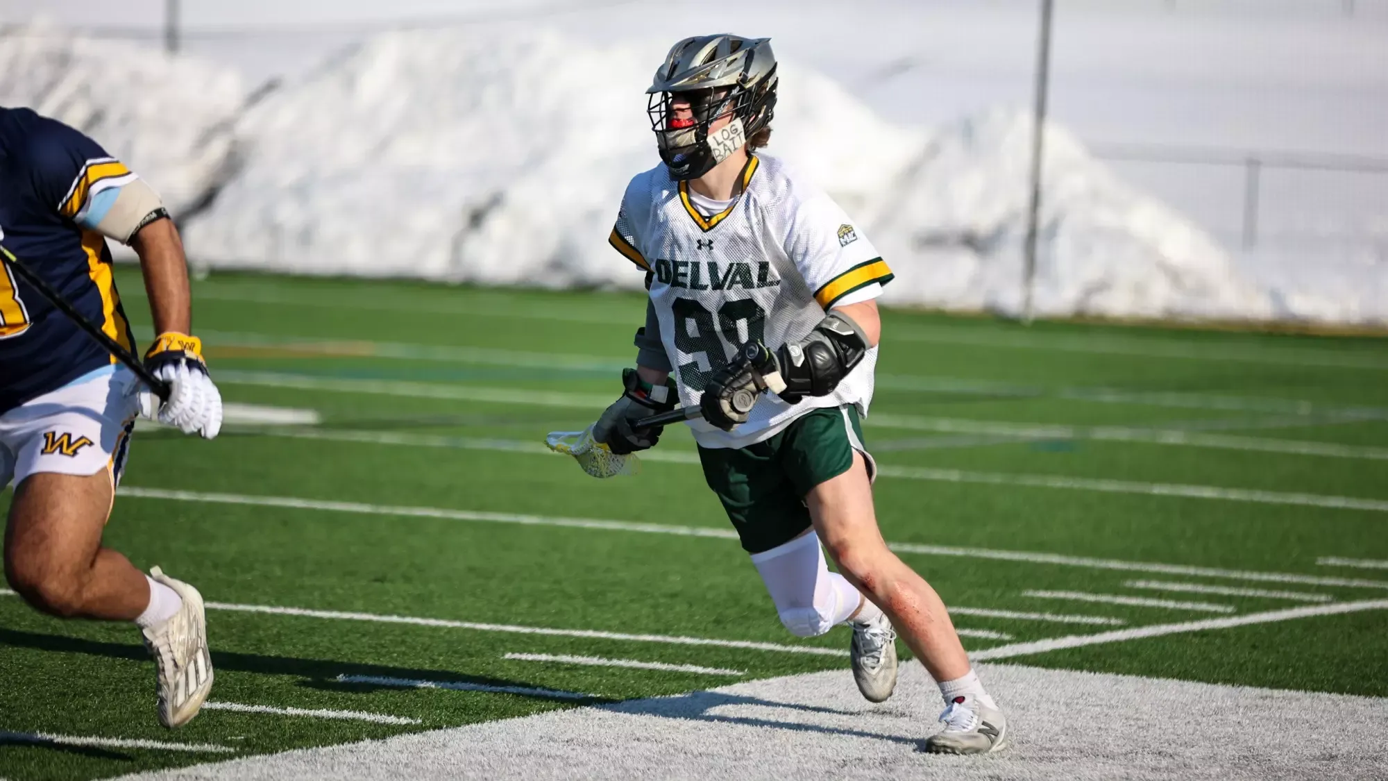 Luke Witko playing lacrosse against Wilkes