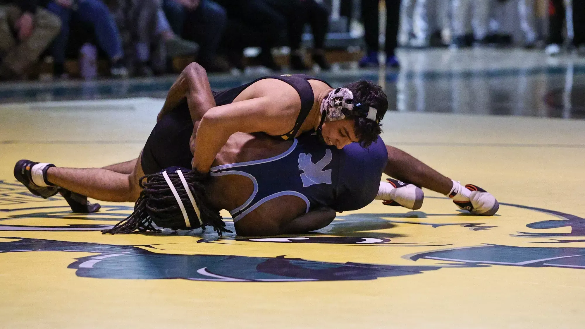 Carlos Panchana wrestling against Kean