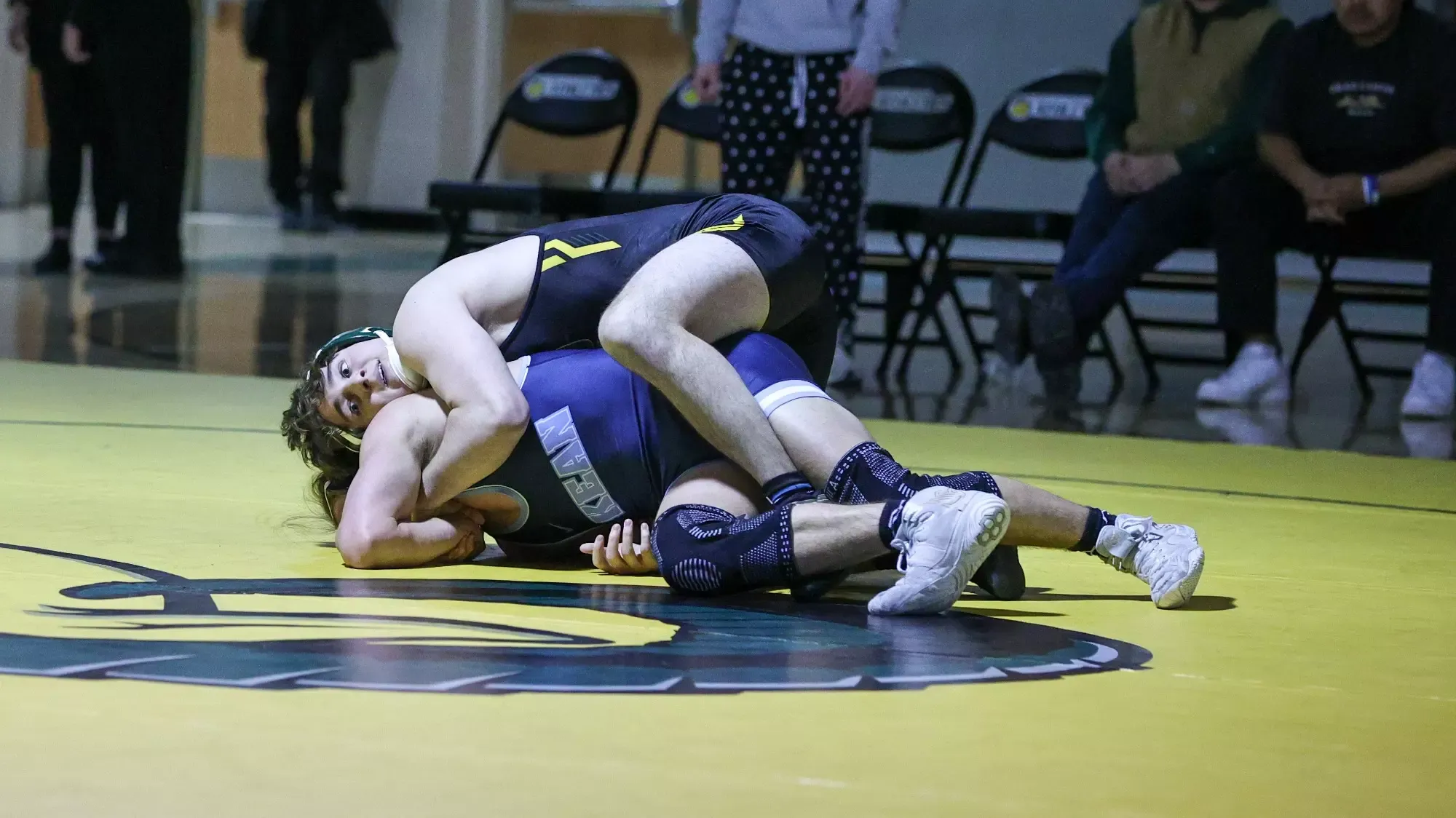 Joseph McCullough wrestling against Kean