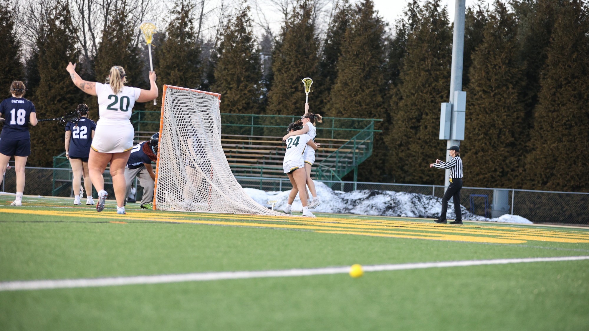WLAX celebrates goal in game vs. Notre Dame Maryland