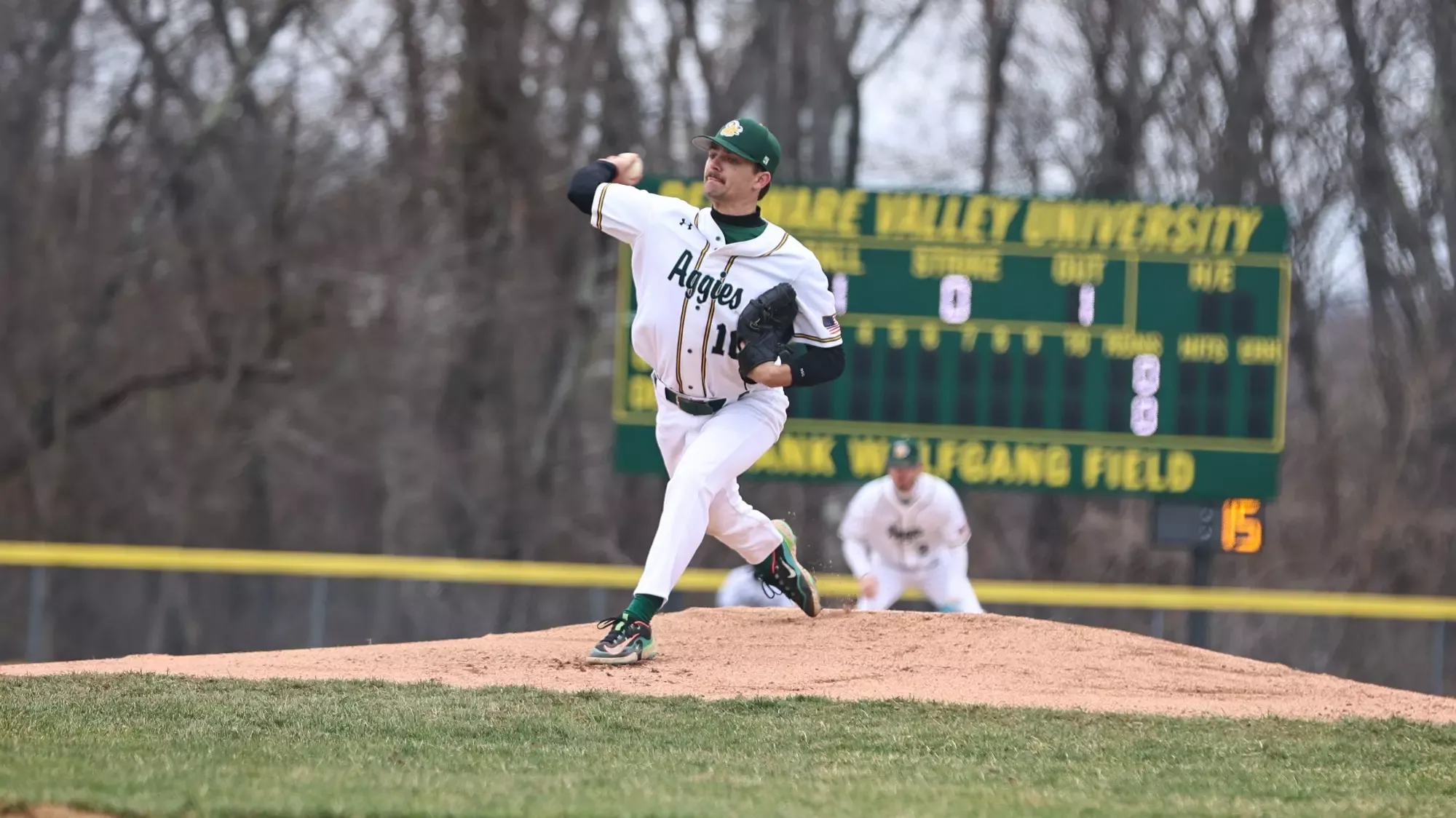 Travis Loewe playing baseball against Misericordia