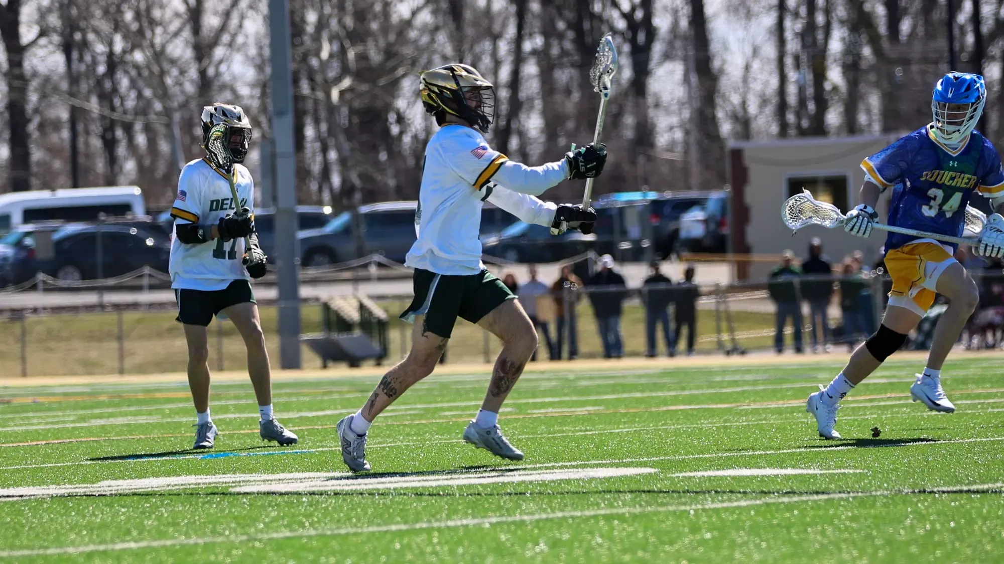 Peter DelRossi playing lacrosse against Goucher