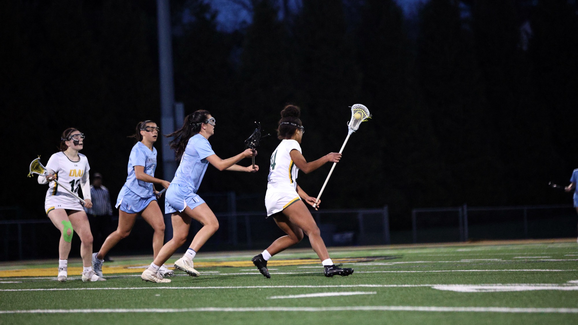 Piper Jones playing women's lacrosse vs. Immaculata