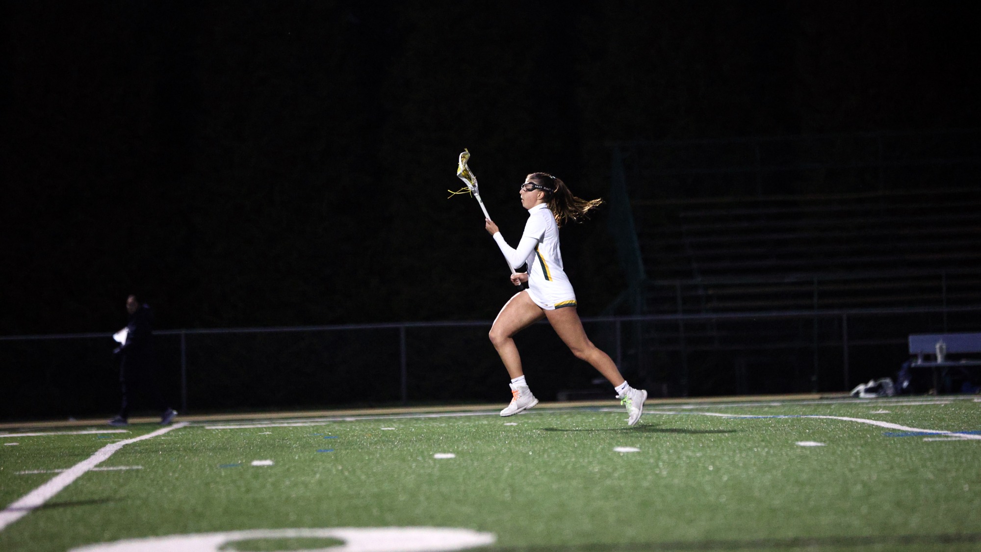 Charley Lengel-Kramer playing women's lacrosse vs. Immaculata