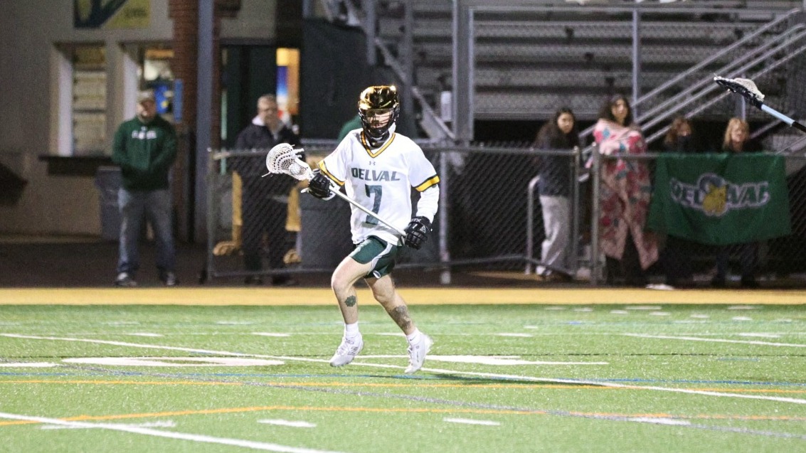 Peter DelRossi playing lacrosse against Immaculata