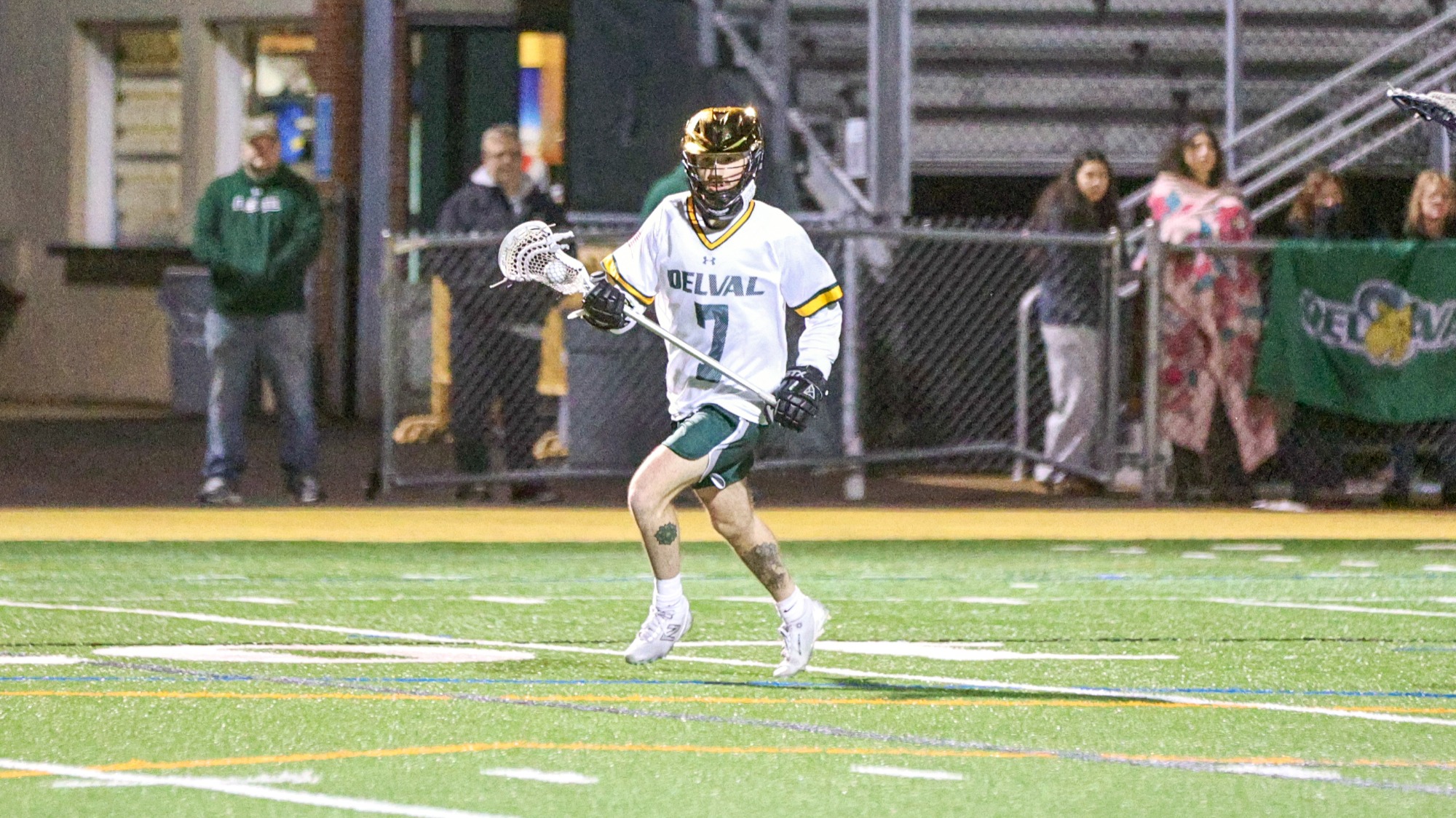 Peter DelRossi playing lacrosse against Immaculata