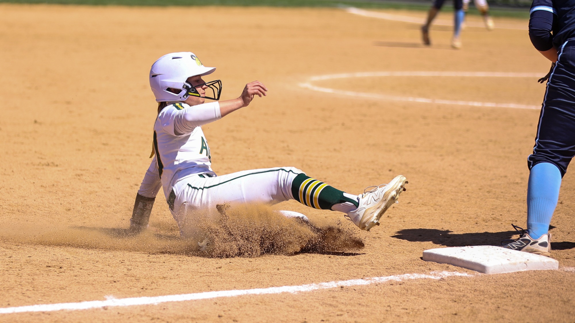 Kenzie Boyd playing softball against Lebanon Valley