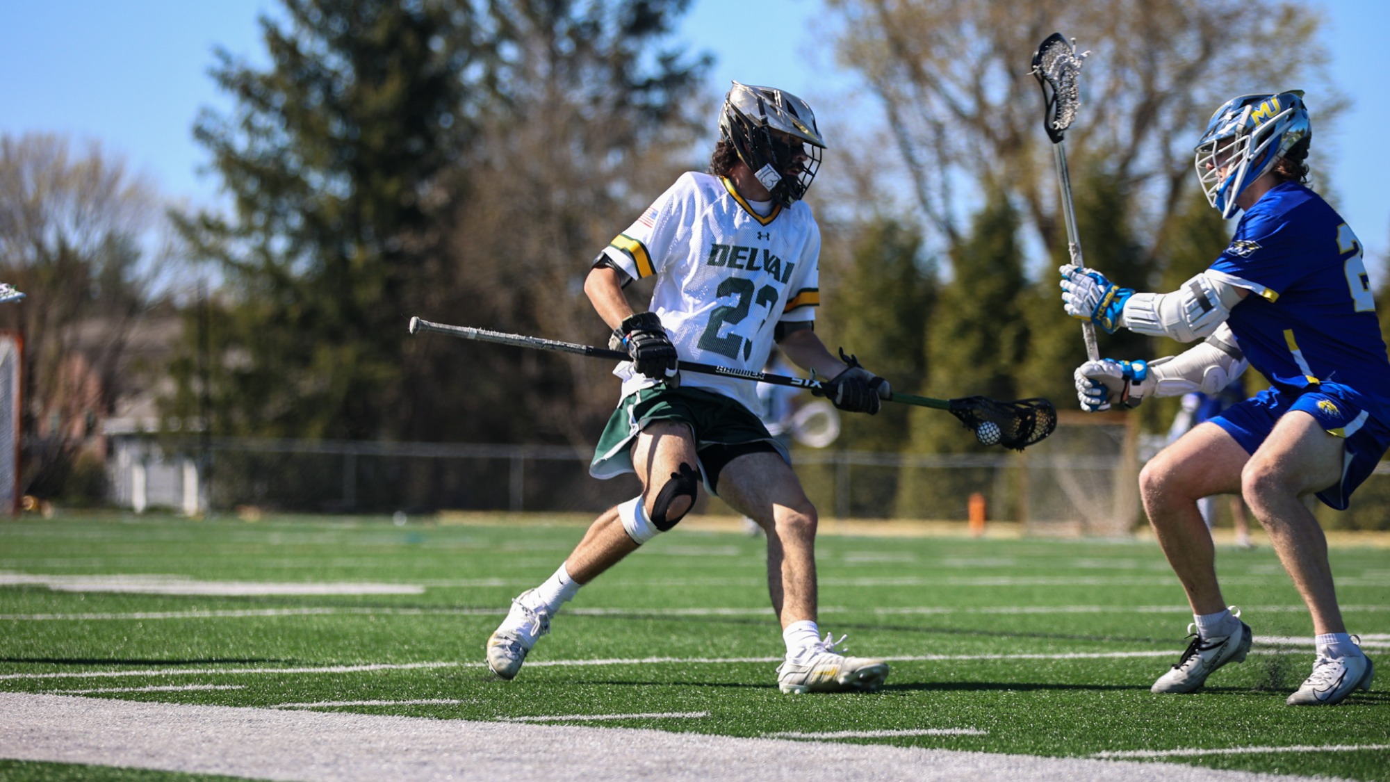 Ashton Benkwitt playing lacrosse against Misericordia 