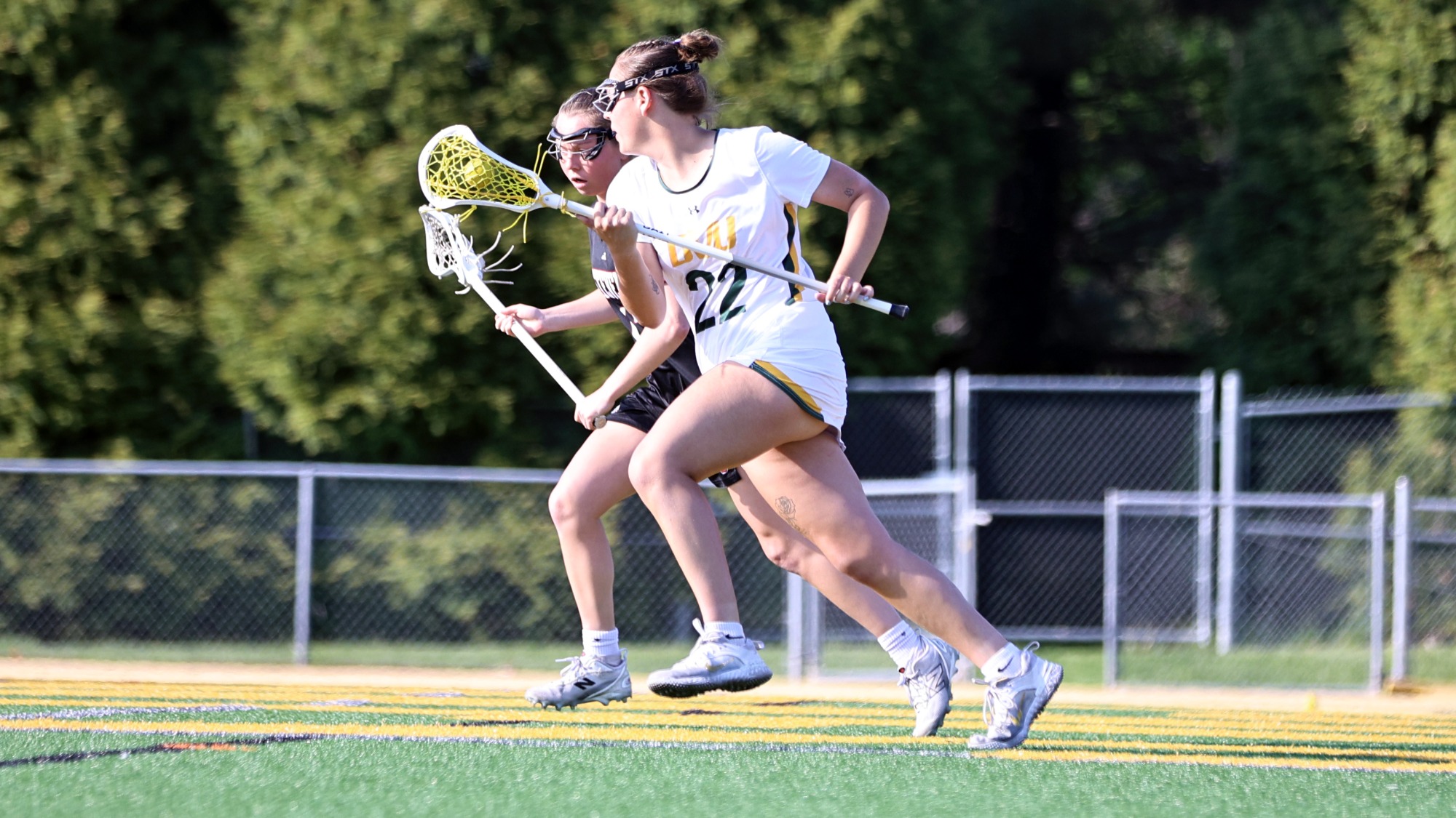 Abbie Hostetler playing women's lacrosse vs. Stevens