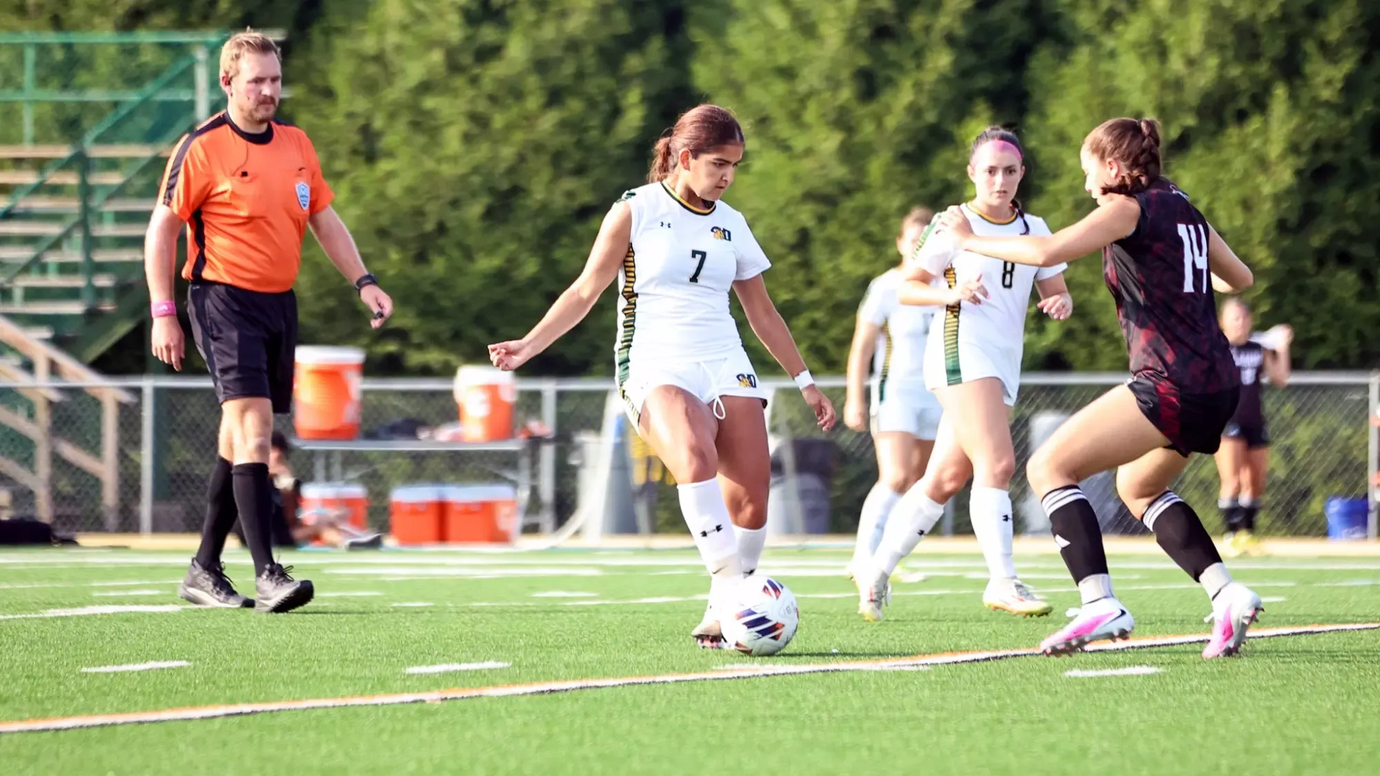 Jazmine Venegas playing soccer against Cairn