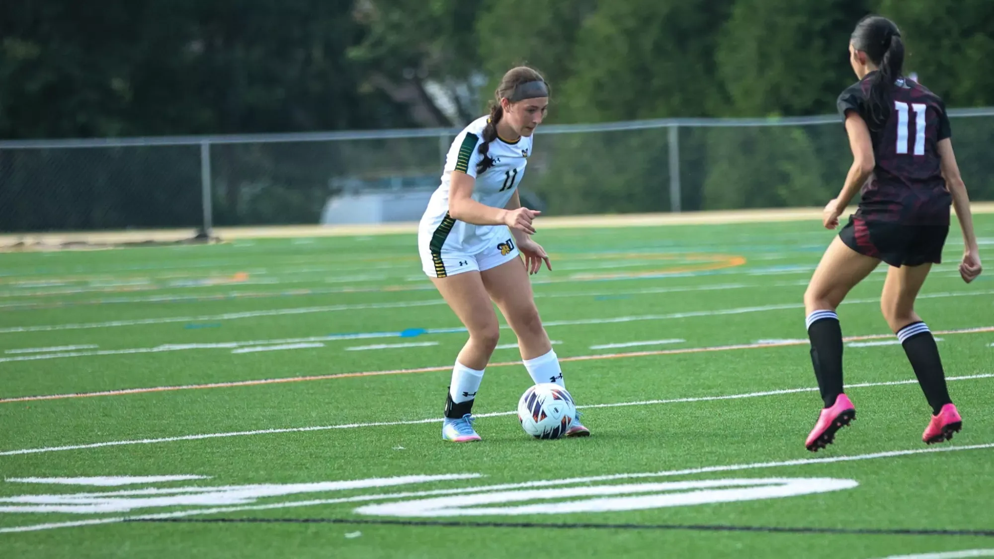 Sarah Tracey playing soccer against Cairn