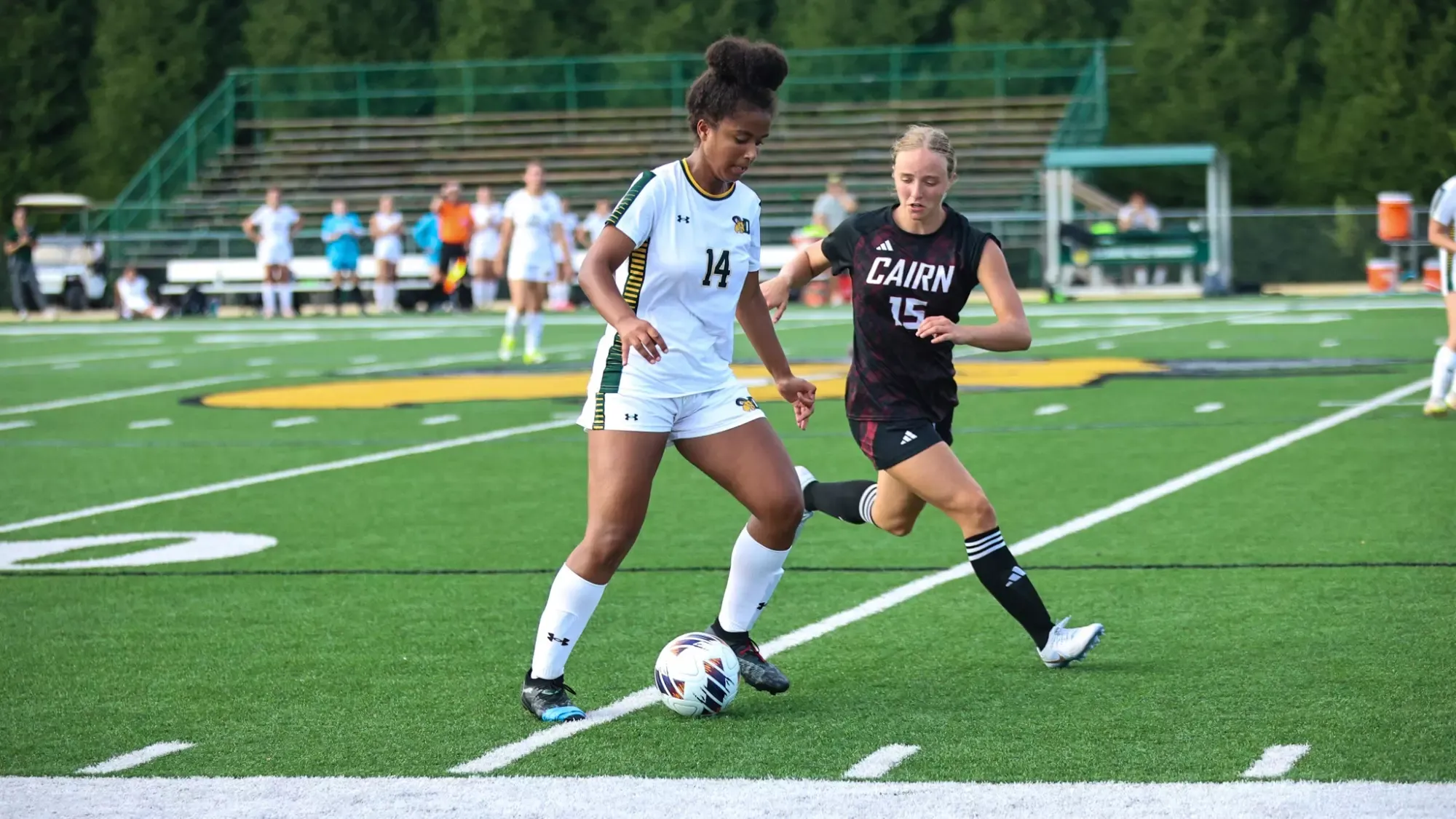 Piper Jones playing soccer against Cairn