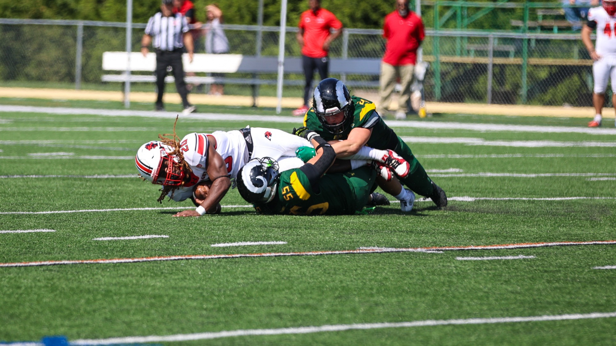 Thomas Arcaroli and Hunter Johnson playing football against Albright