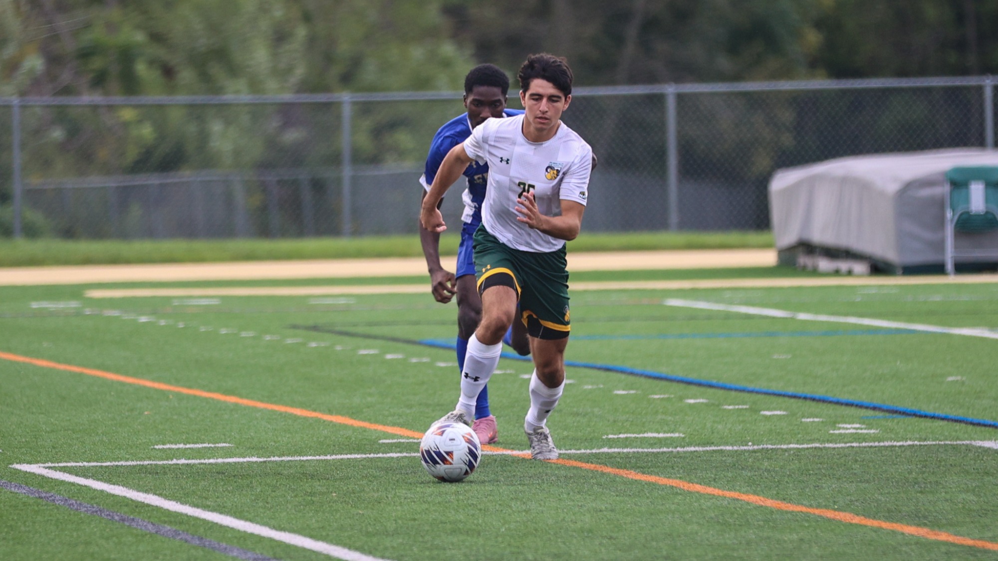 Chalie Sheel playing soccer against Lehman