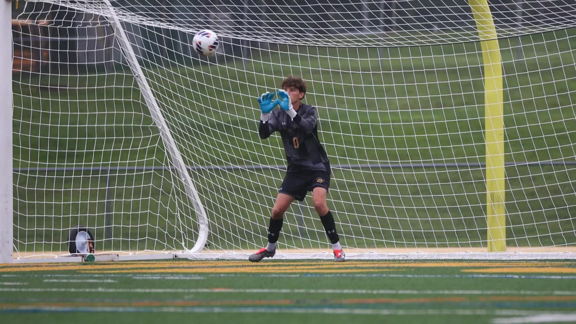 Nick Becker playing soccer against Eastern