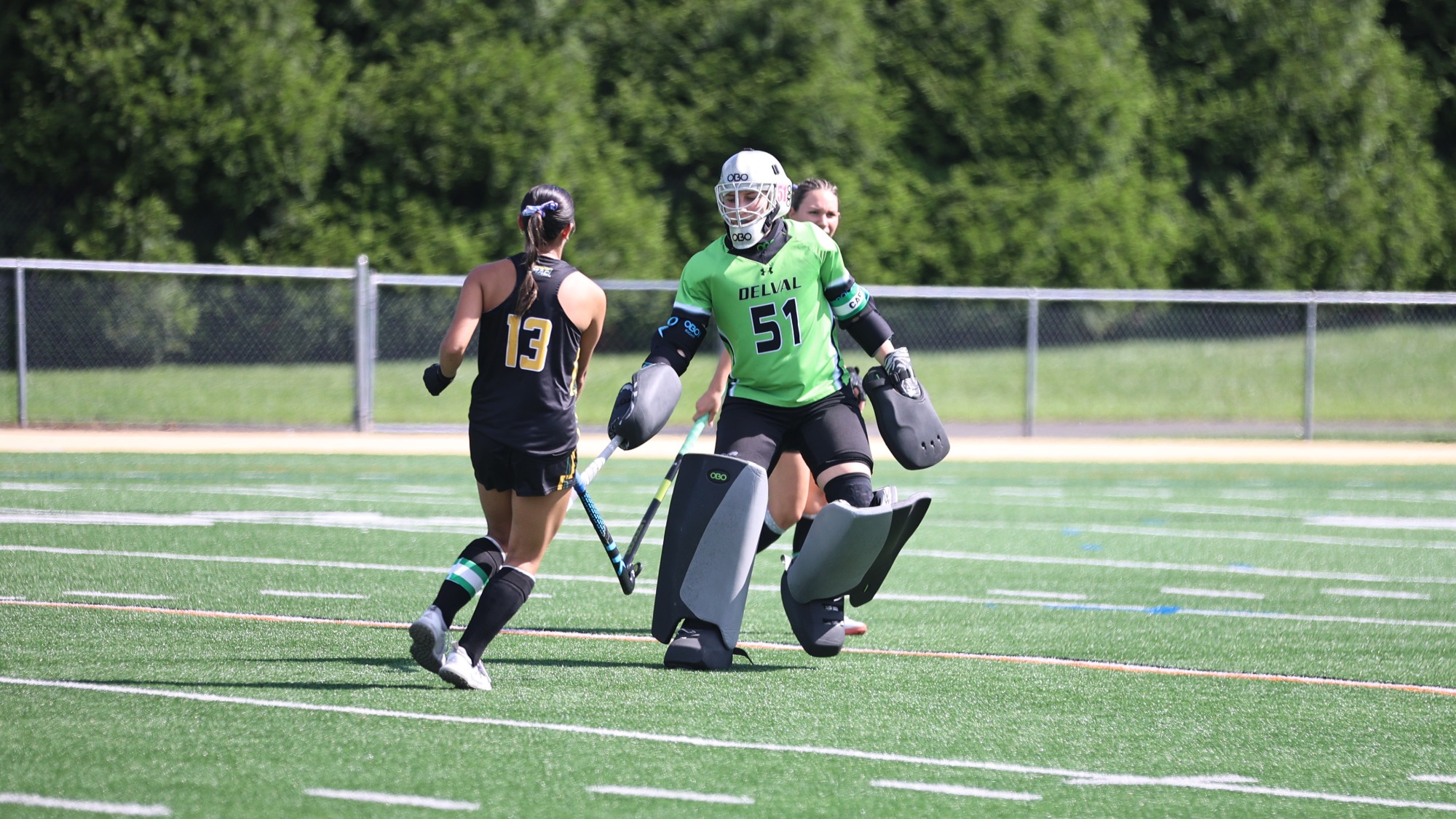 Jillian Collins and Gracyn Shutt playing field hockey vs. Albright